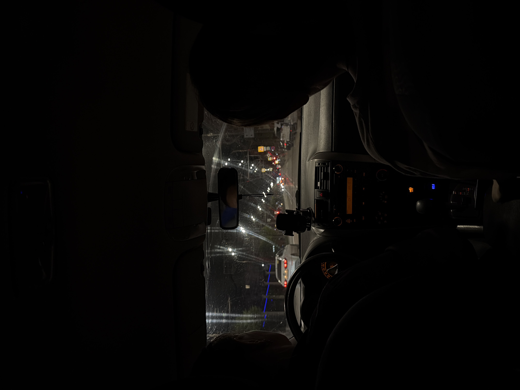 Evening drive through Izhevsk streets captured from vehicle interior