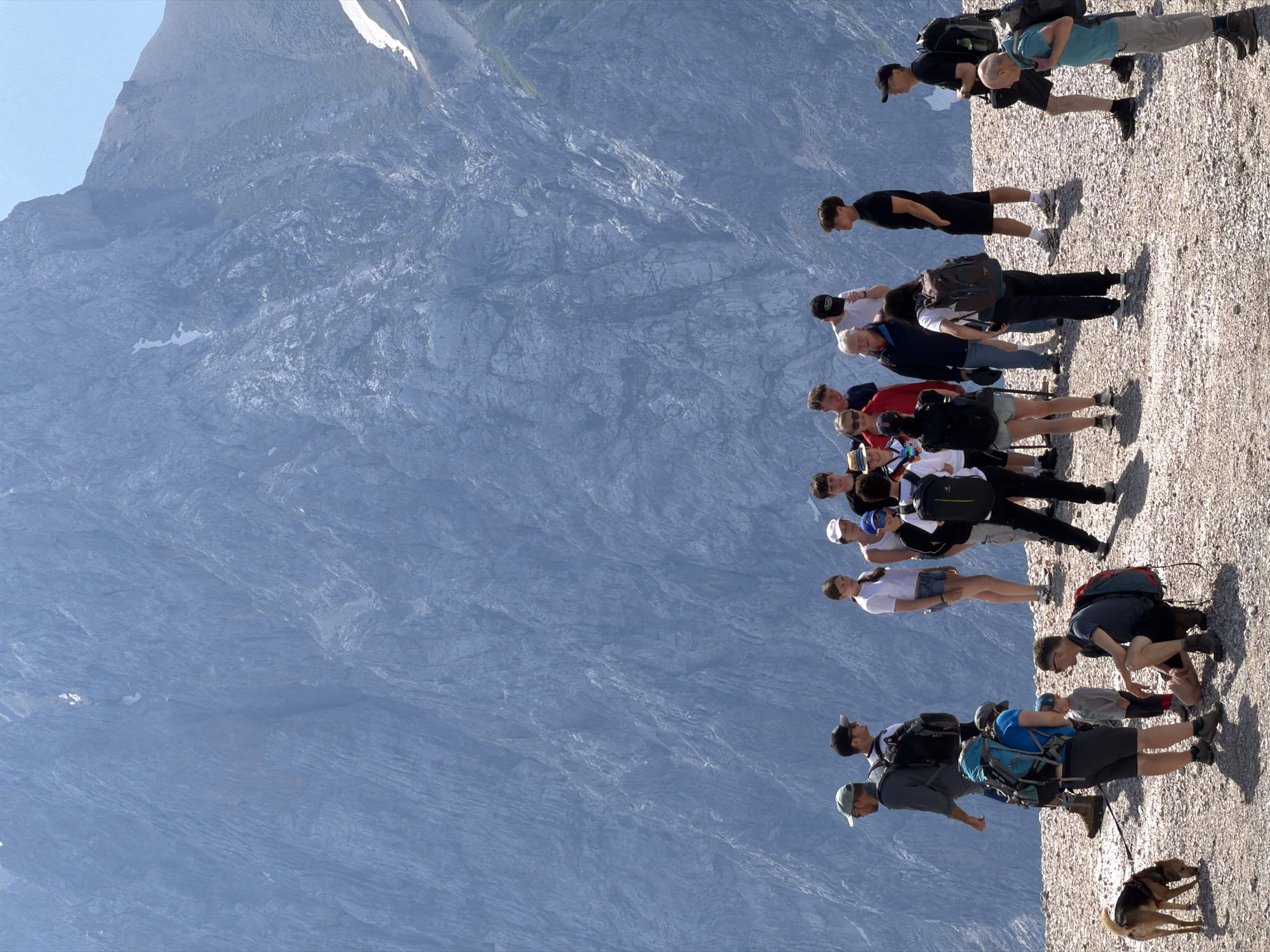 Hikers on rocky alpine terrain above Garmisch-Partenkirchen