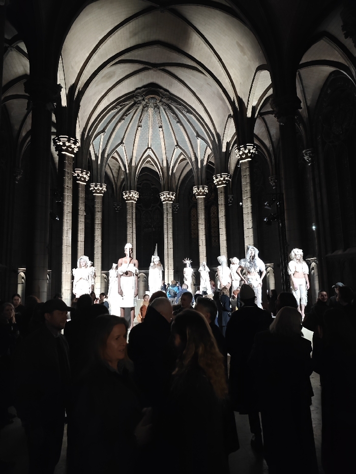 Fashion show staged in Paris gothic cathedral features white garments