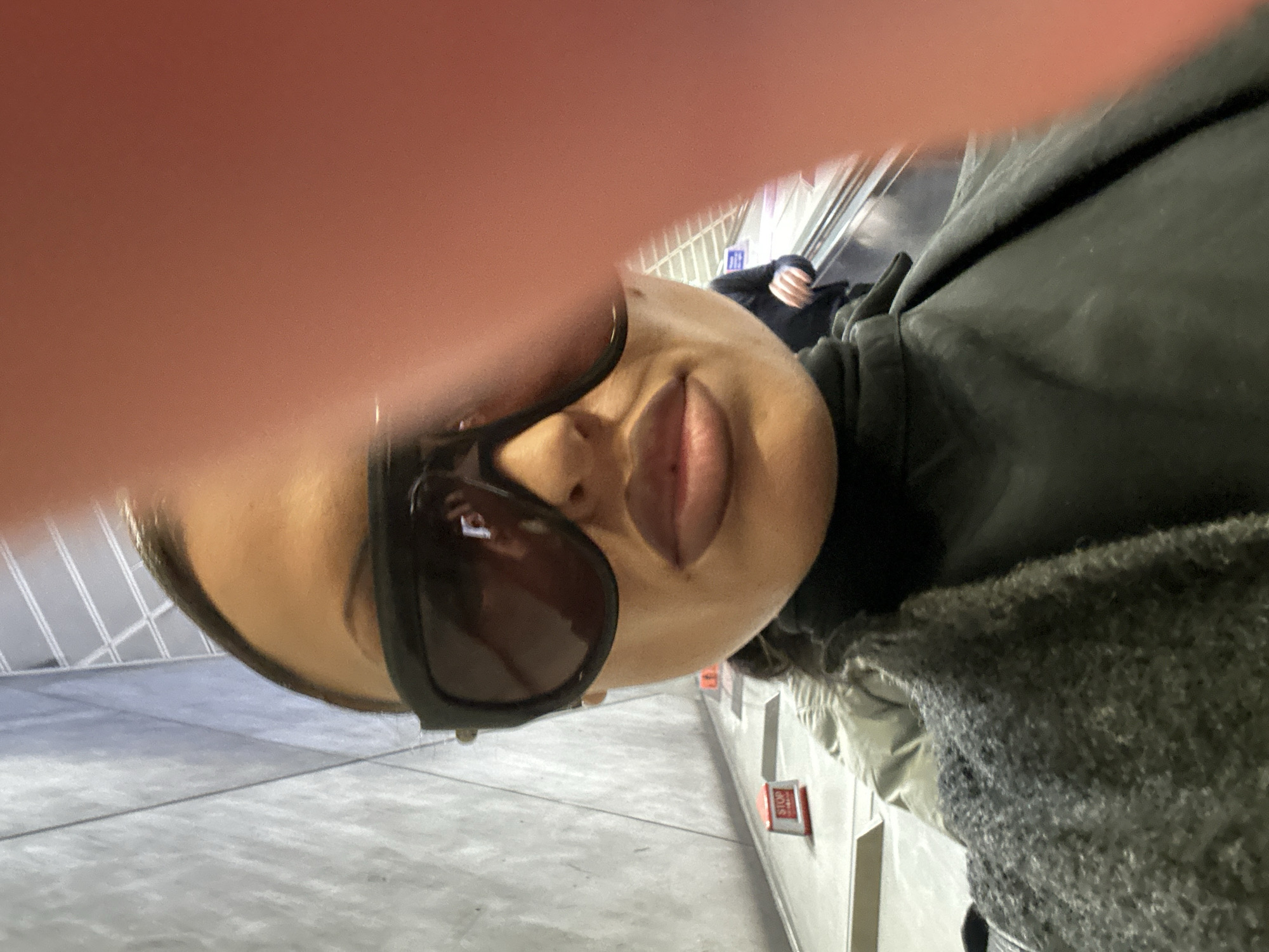 Person photographed on London escalator Thursday morning