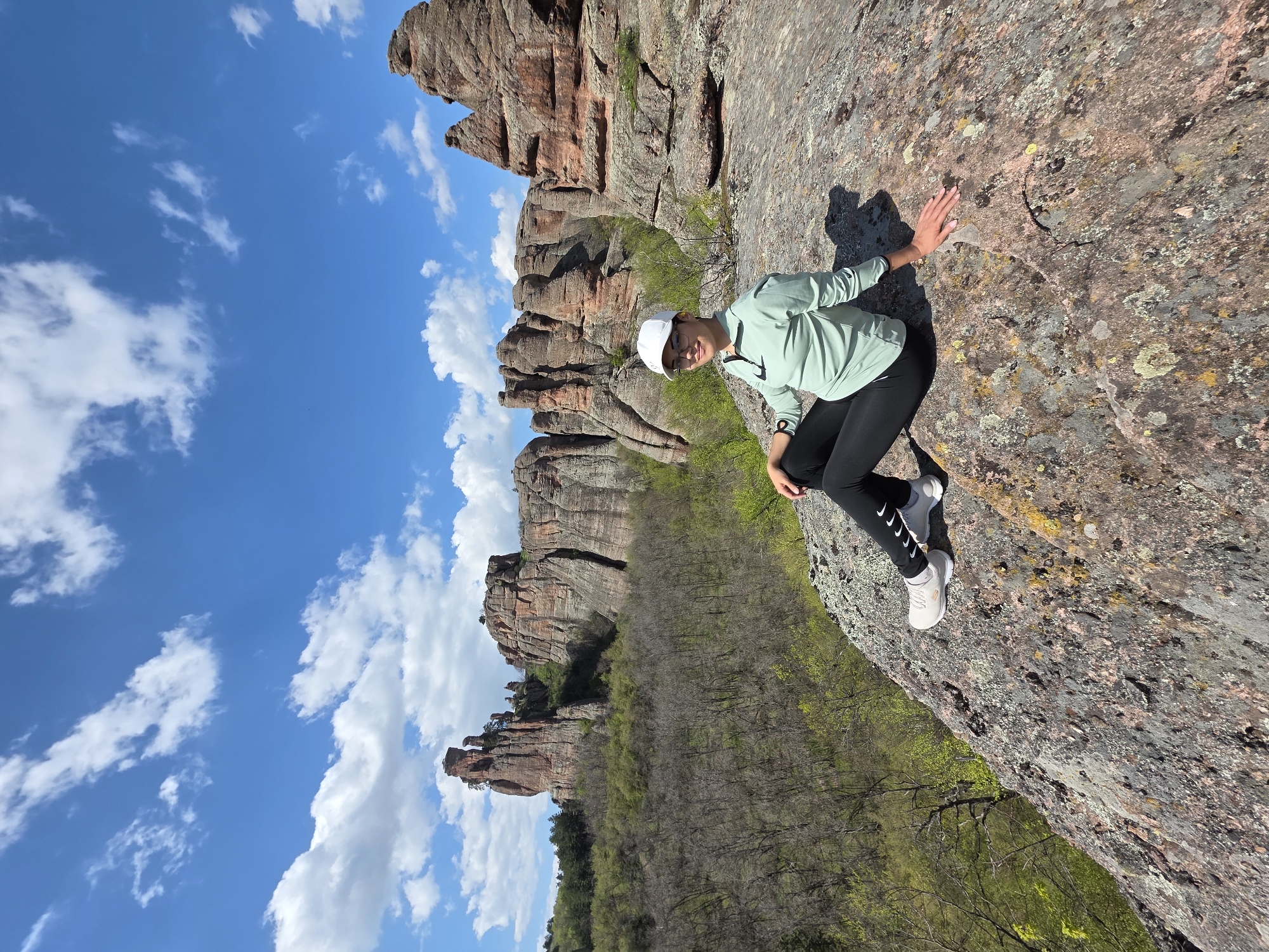 Tourists with dog visit famous Belogradchik Rocks in Bulgaria