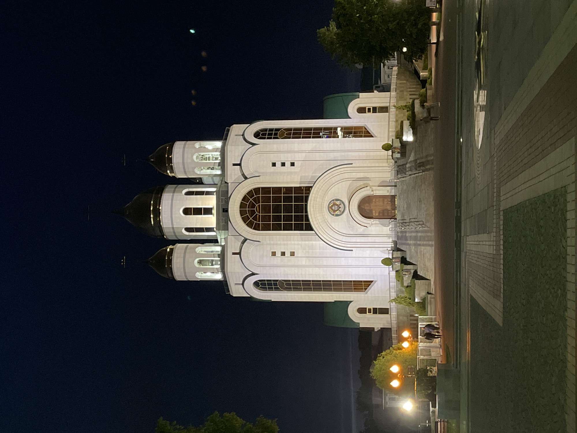 Nighttime stroll captures illuminated Kaliningrad landmarks and streetscape