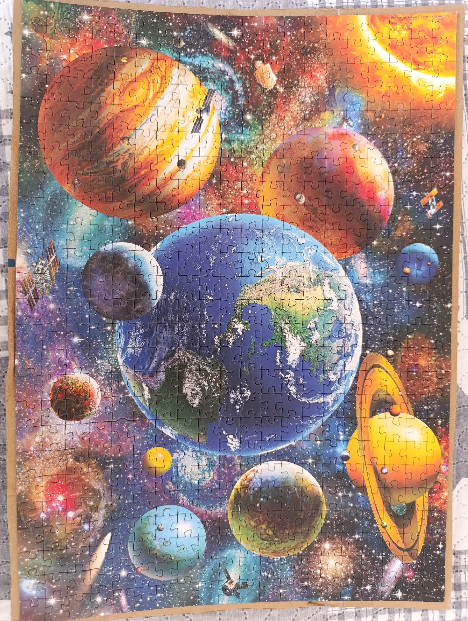 Art collection featuring puzzles, paintings, books documented in Dobrich