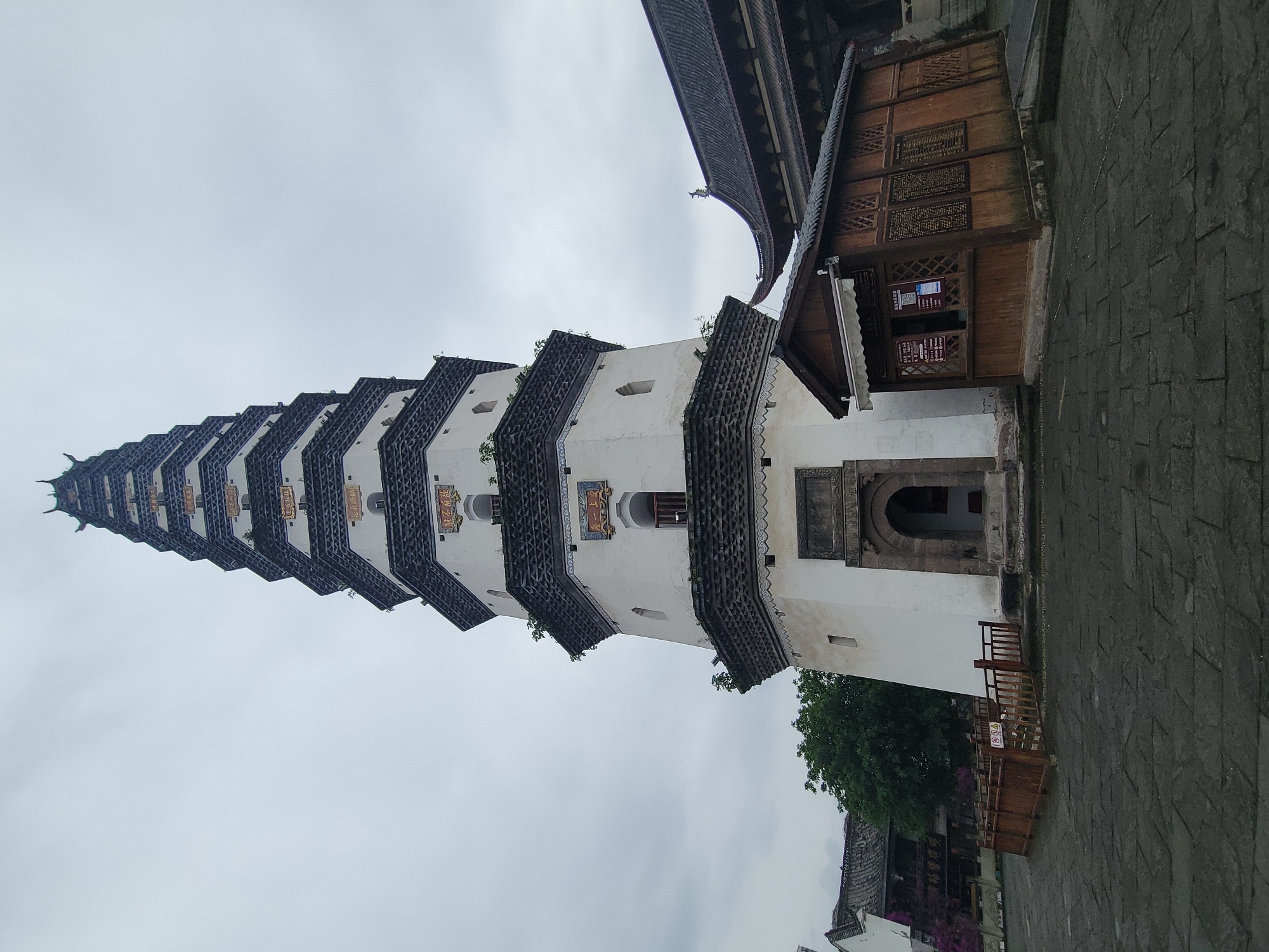 Tourist documents traditional architecture tour through Hechuan, China