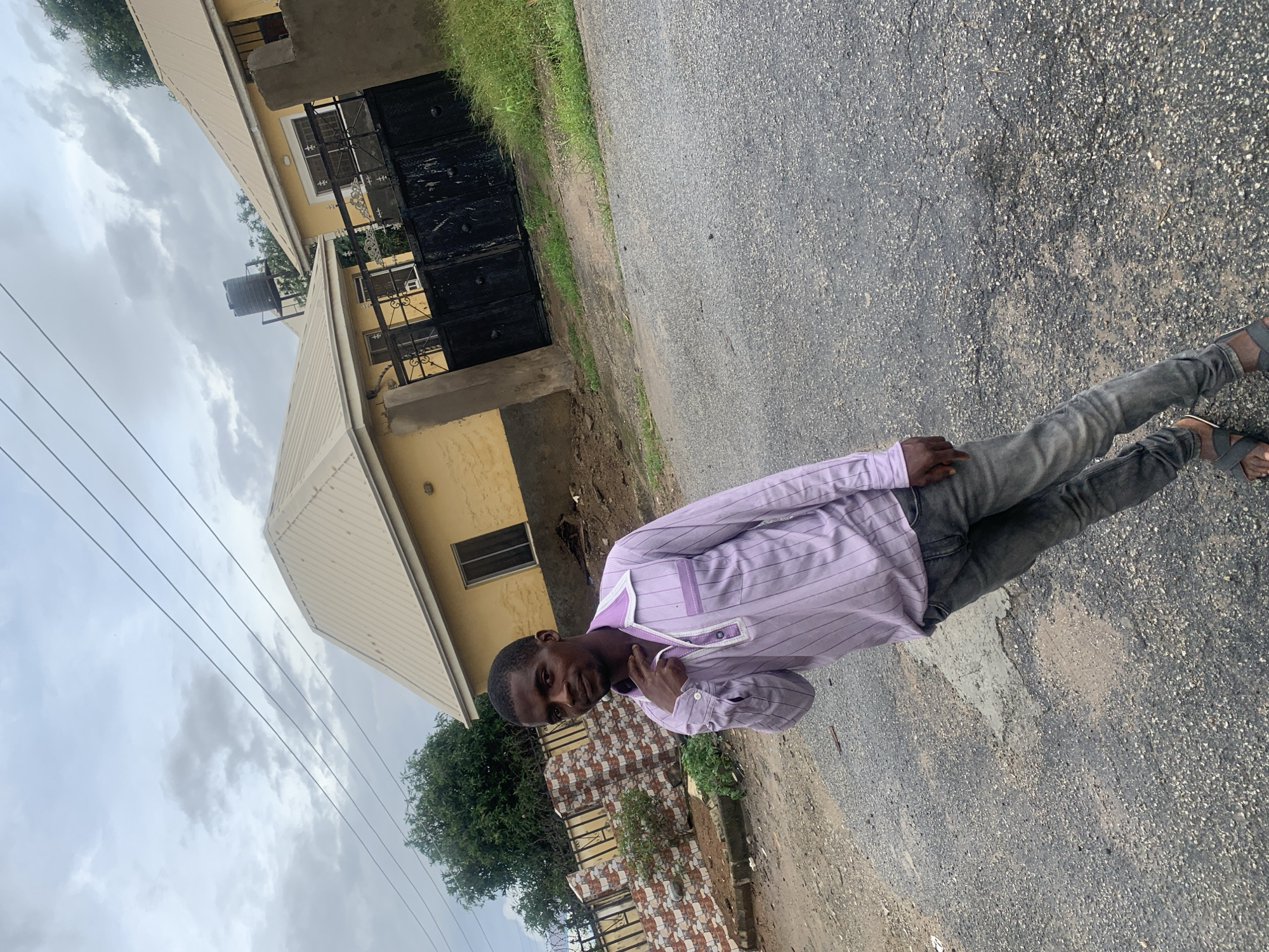 Casual street portraits along a residential block in Abuja