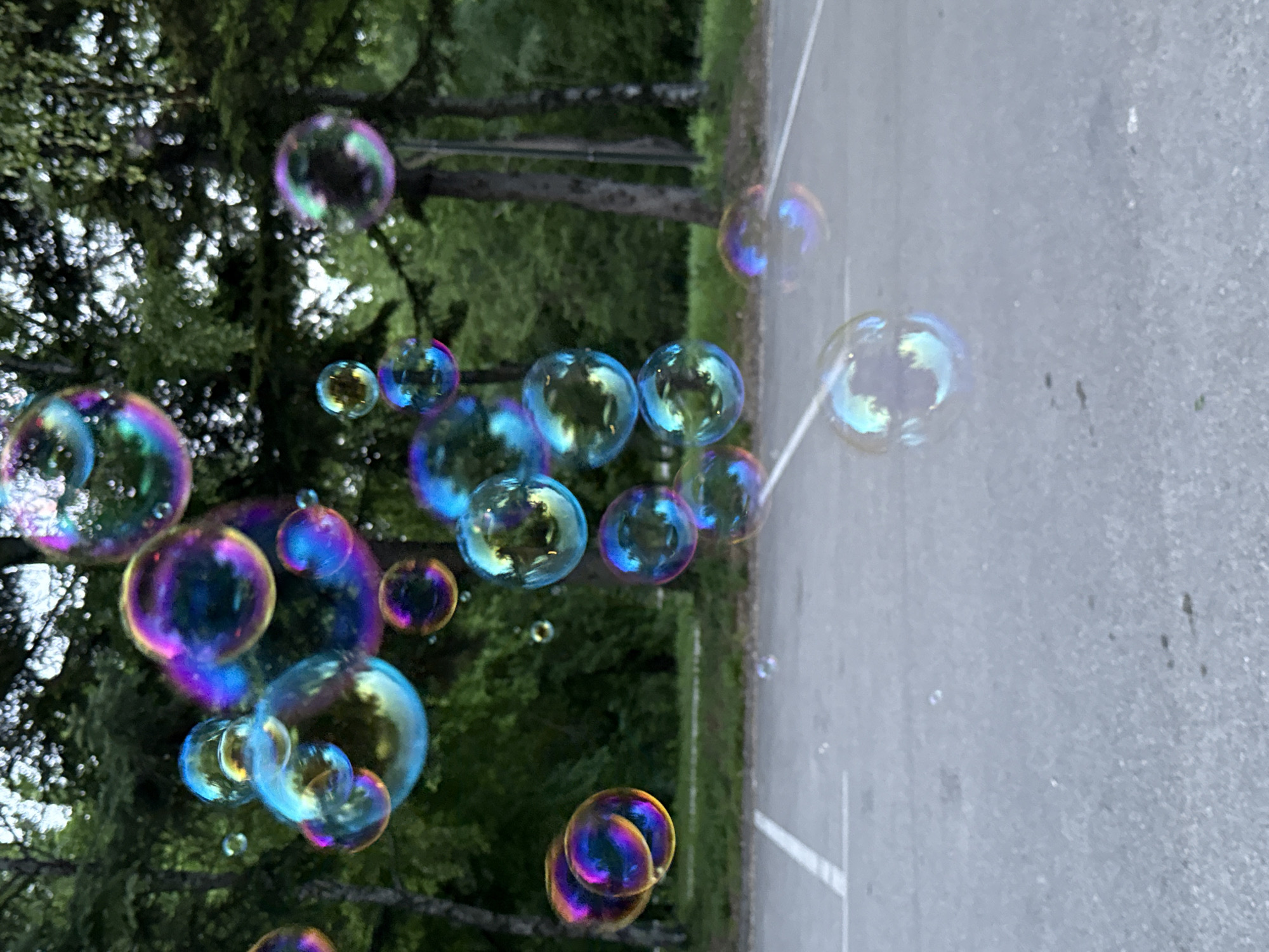 Couple makes soap bubbles in Pleven parking lot