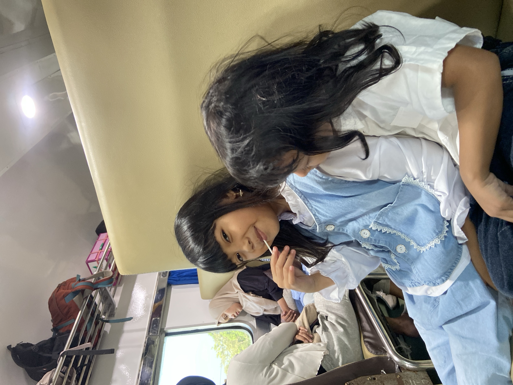 Two girls found lying in train luggage compartment