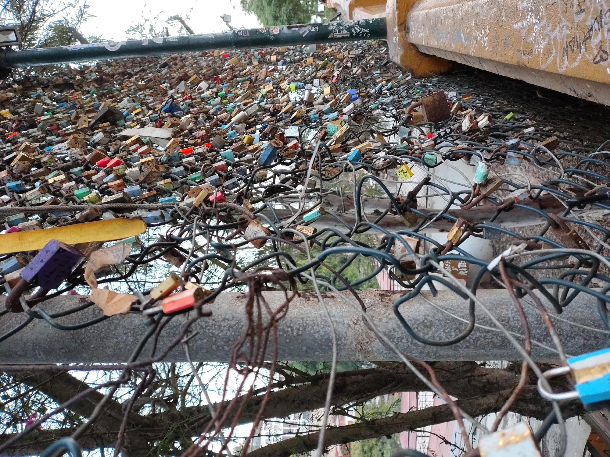 Love locks display documented on Barranco fence in Peru