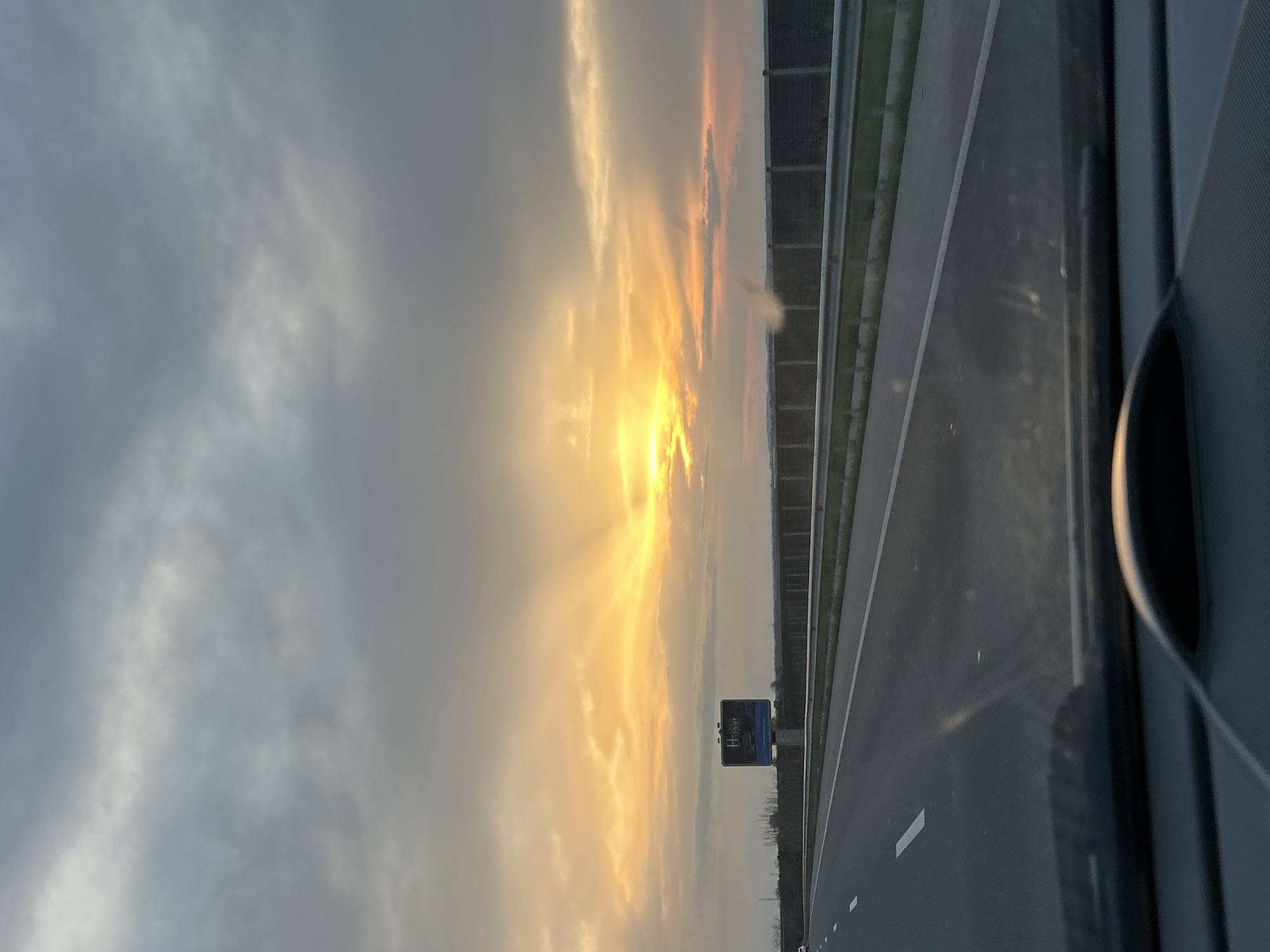Vehicle captures sunset highway scene near Cherna Gora, Bulgaria