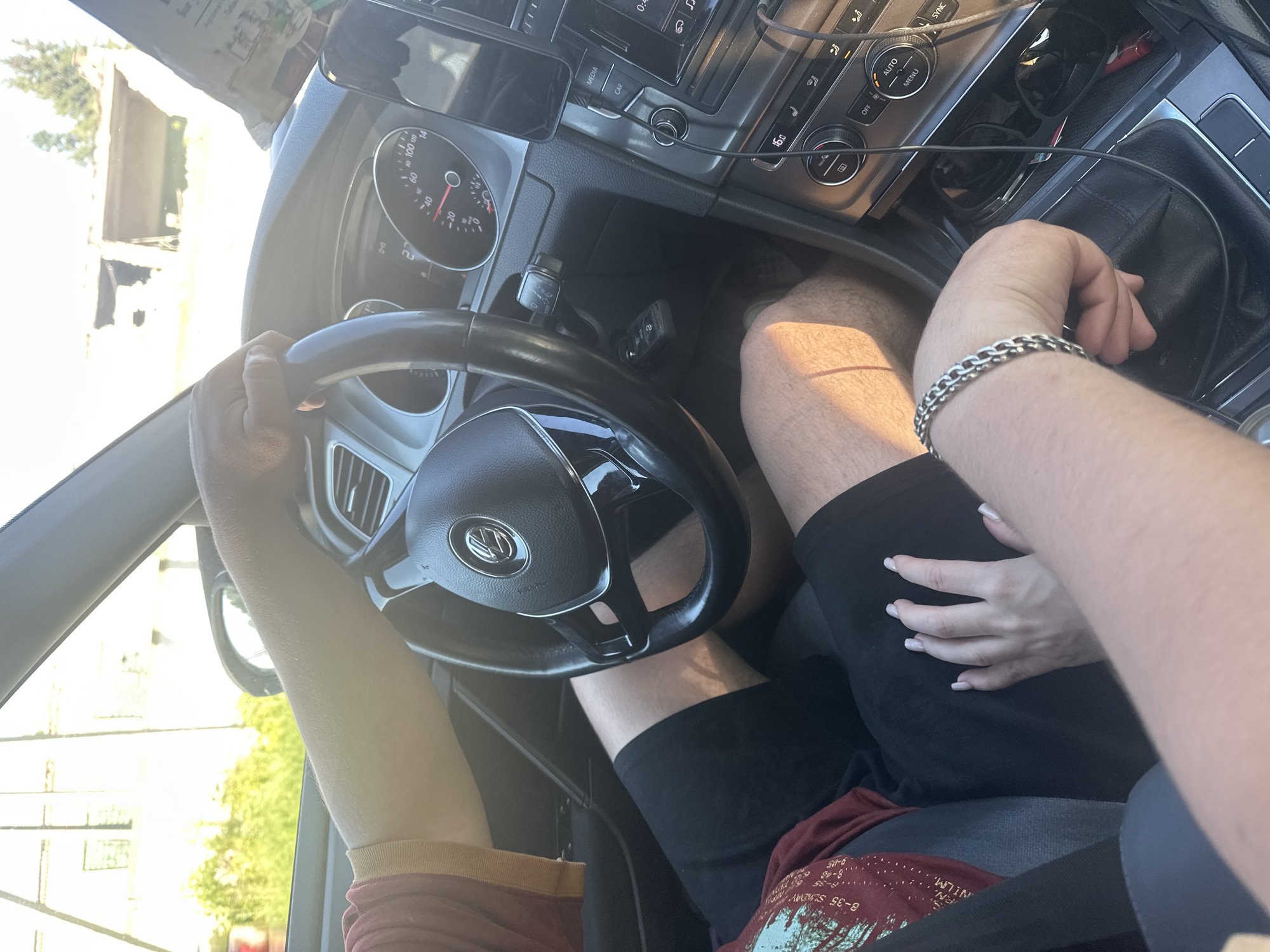 Young couple's car journey documented through Vasilievo, Russia