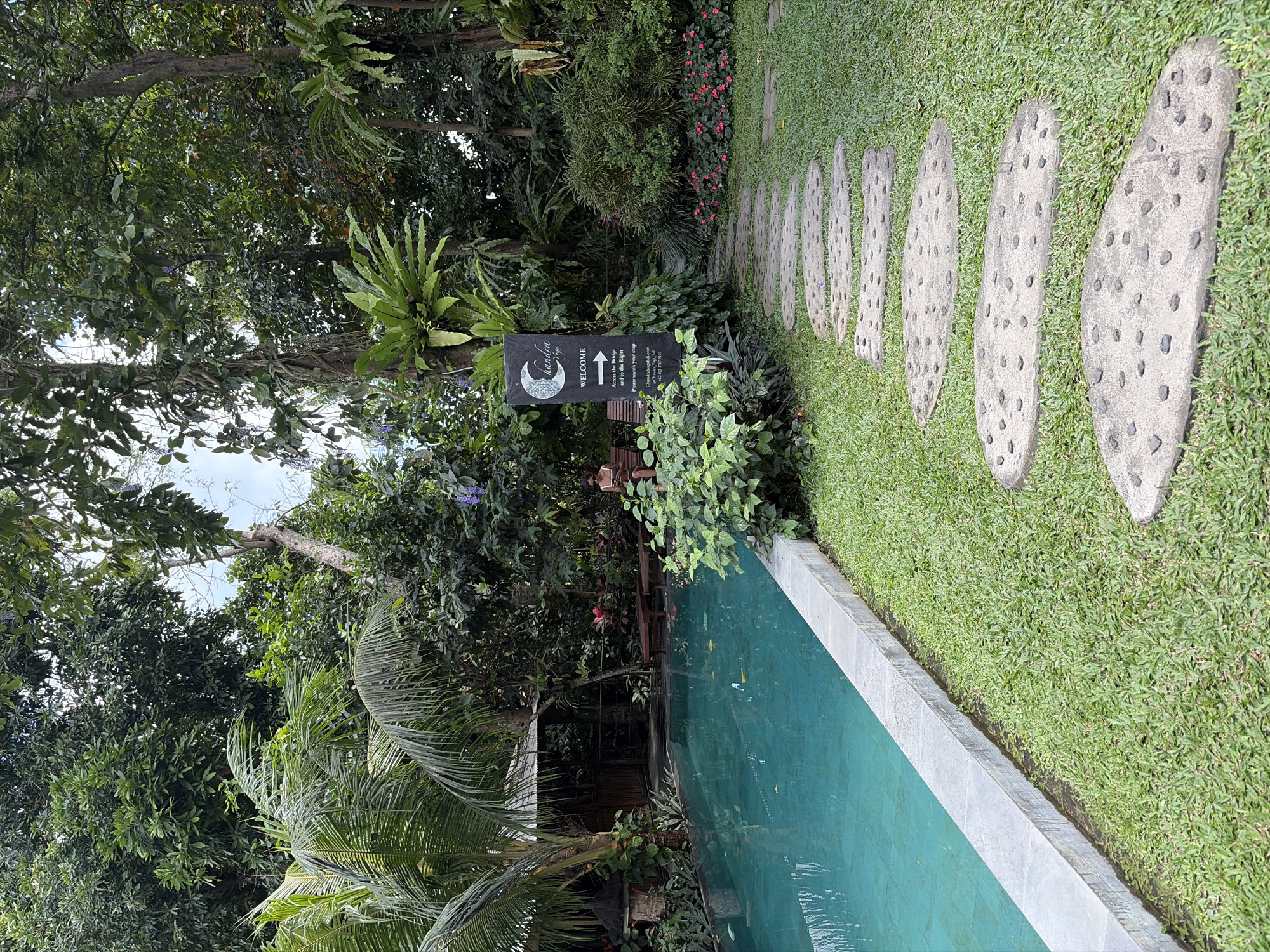 Resort grounds and rice paddies side by side in Mengwi, Bali