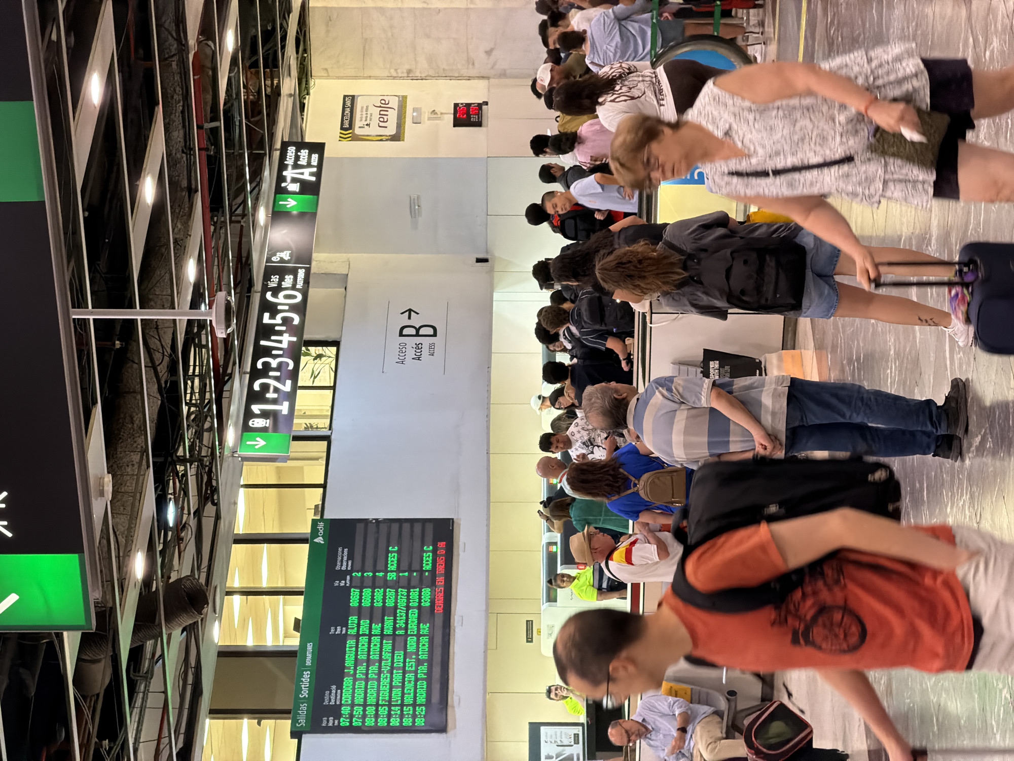 Morning rush through Barcelona Sants and airport terminals
