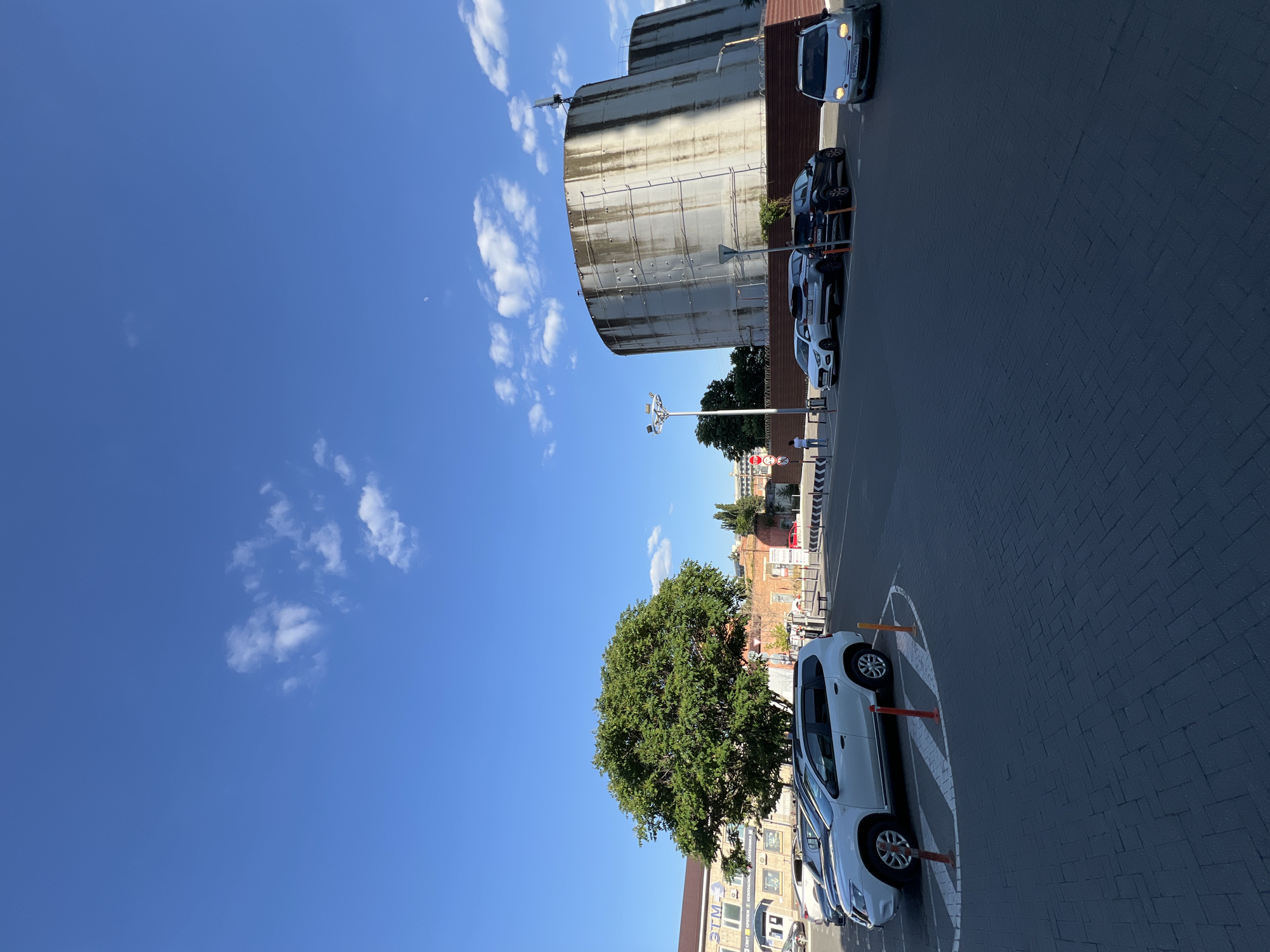 Krasnodar street scenes, apartment blocks, and hardware store browsing