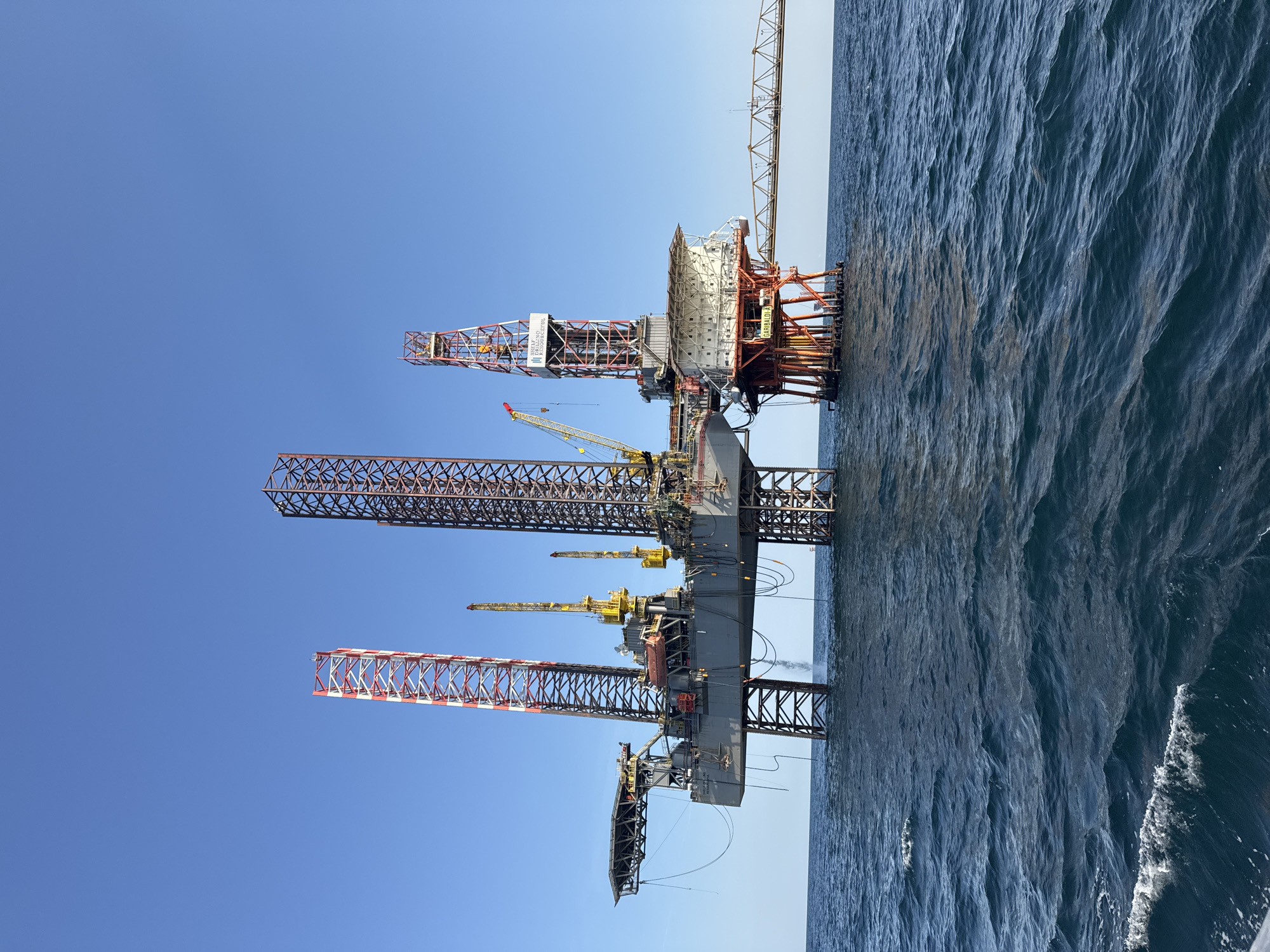 Offshore oil rig in the Adriatic under clear skies