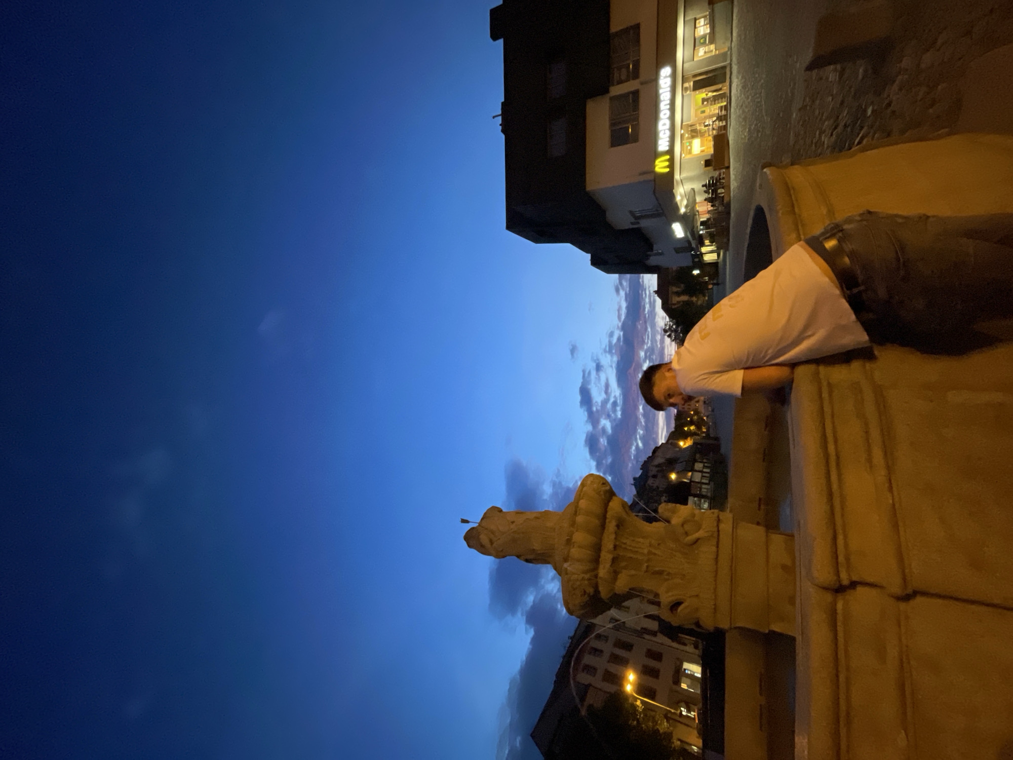Evening scenes around Jihlava's square, forest, and old building