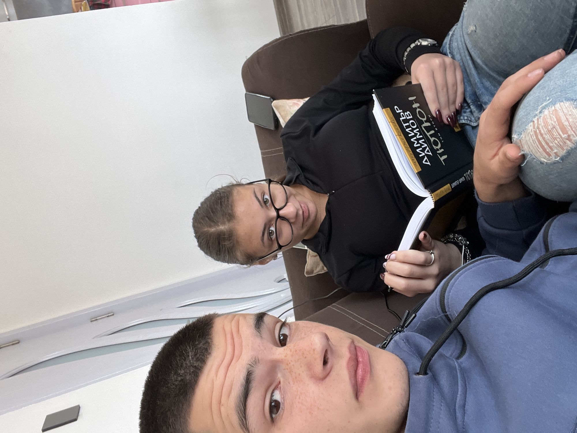 Young couple shares quiet Sunday afternoon in Bulgarian home