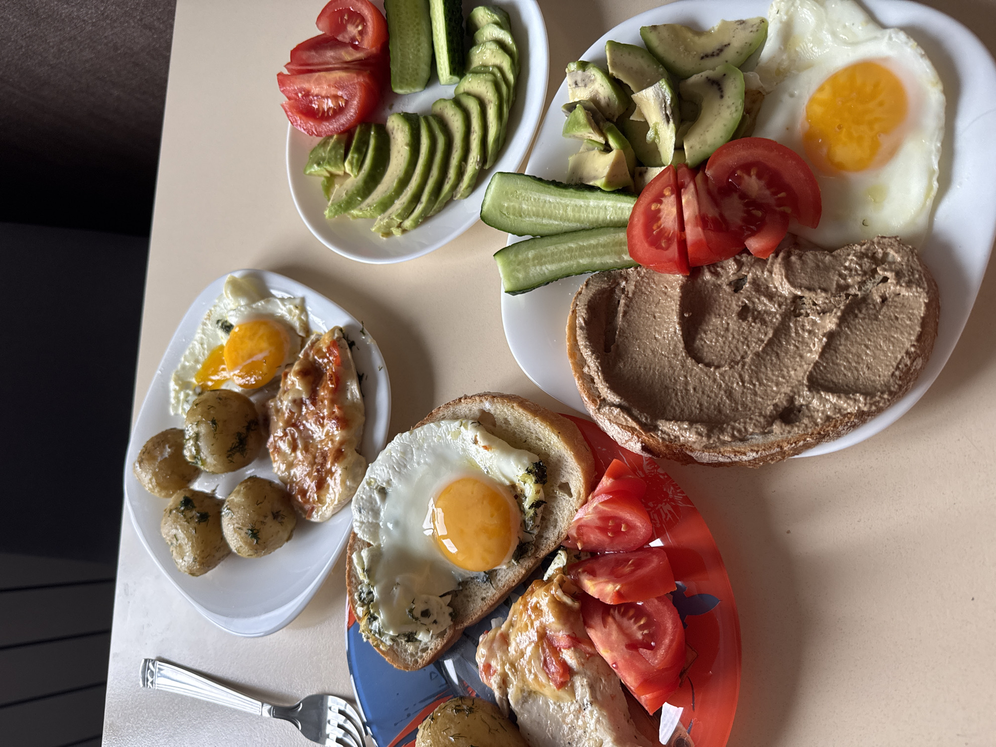 A full breakfast spread on the table in Kharkiv