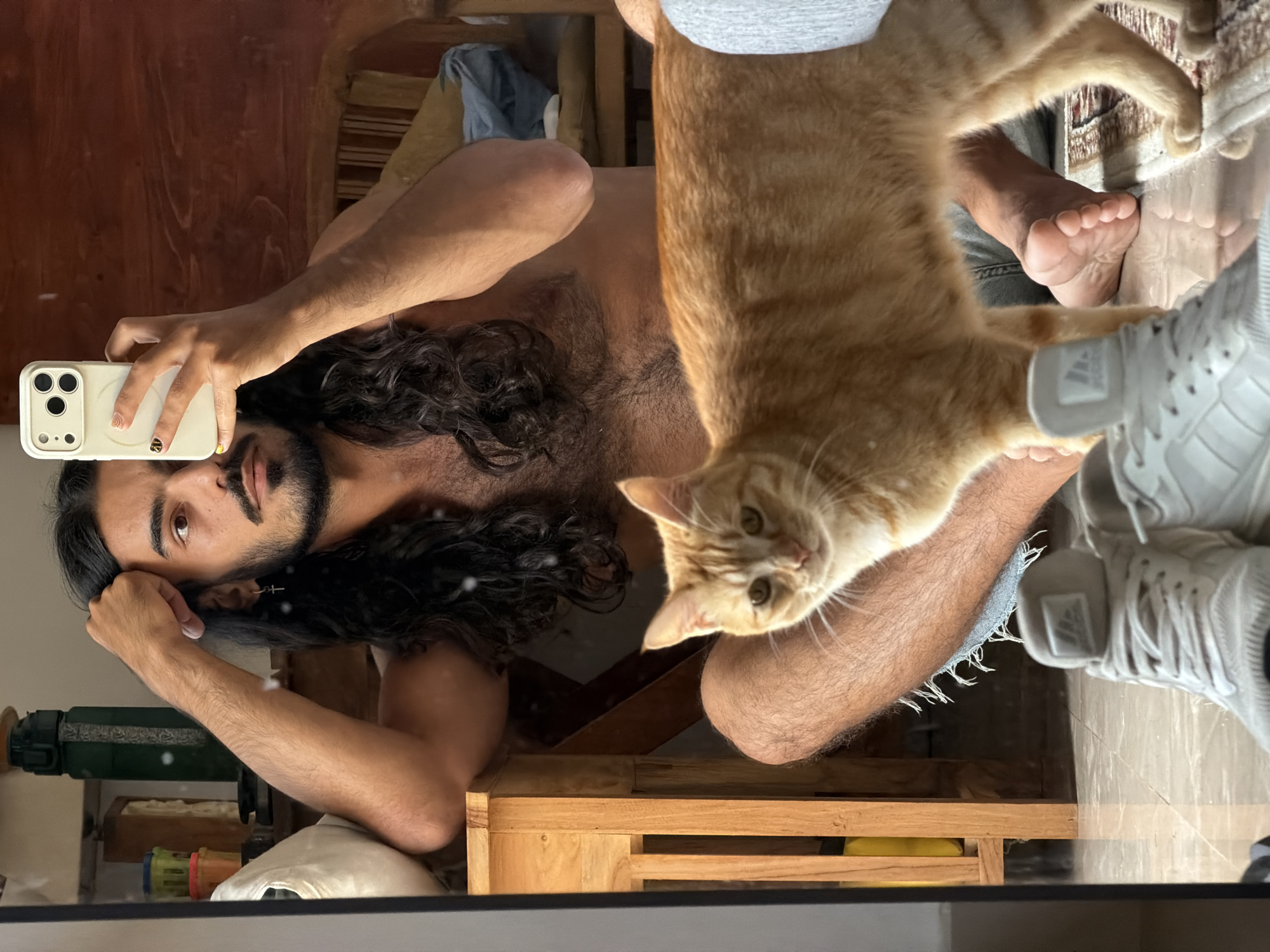 Selfies and an orange tabby cat at home in Bali