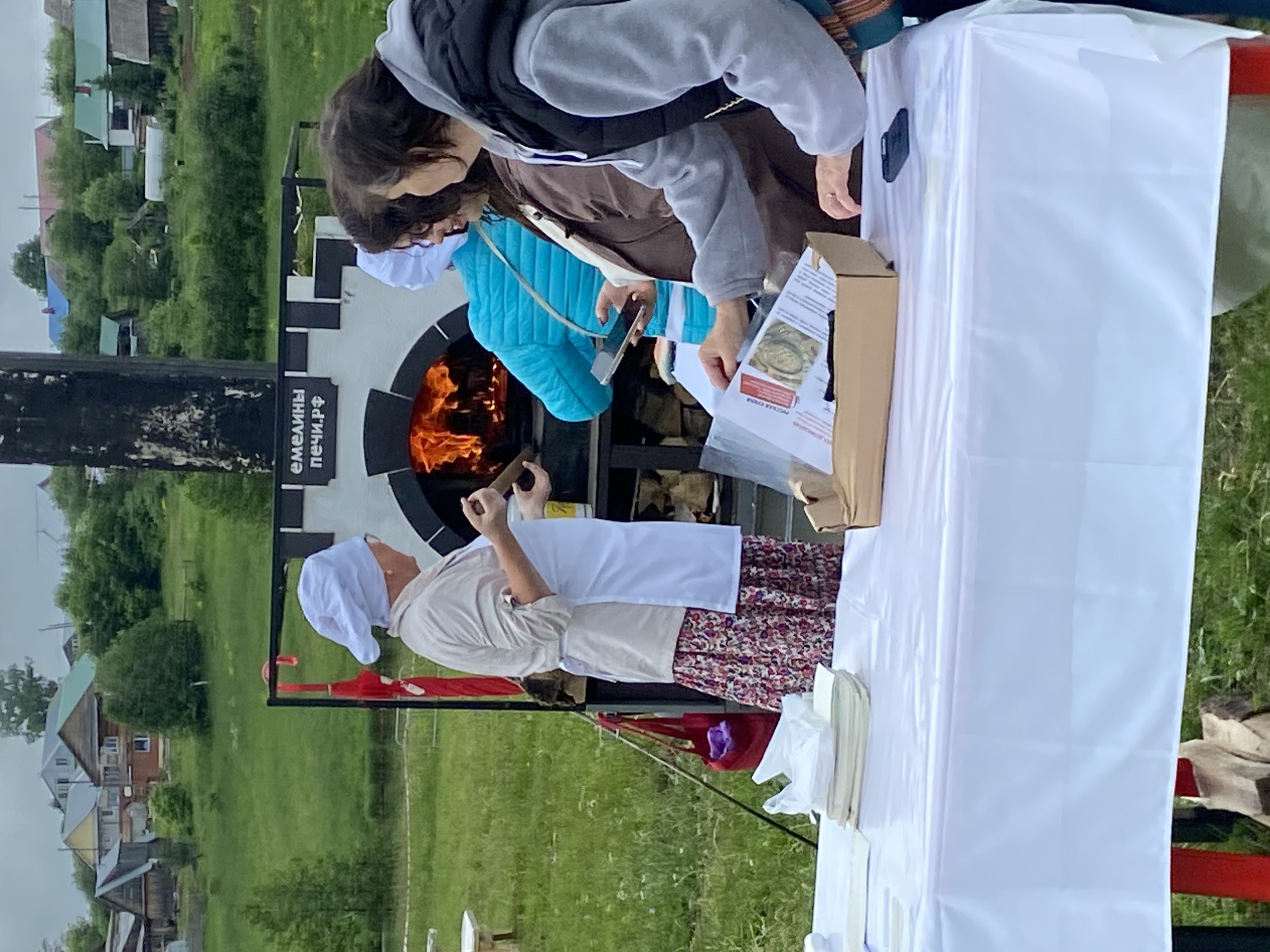 Outdoor cooking festival with wood ovens held in Foki, Russia