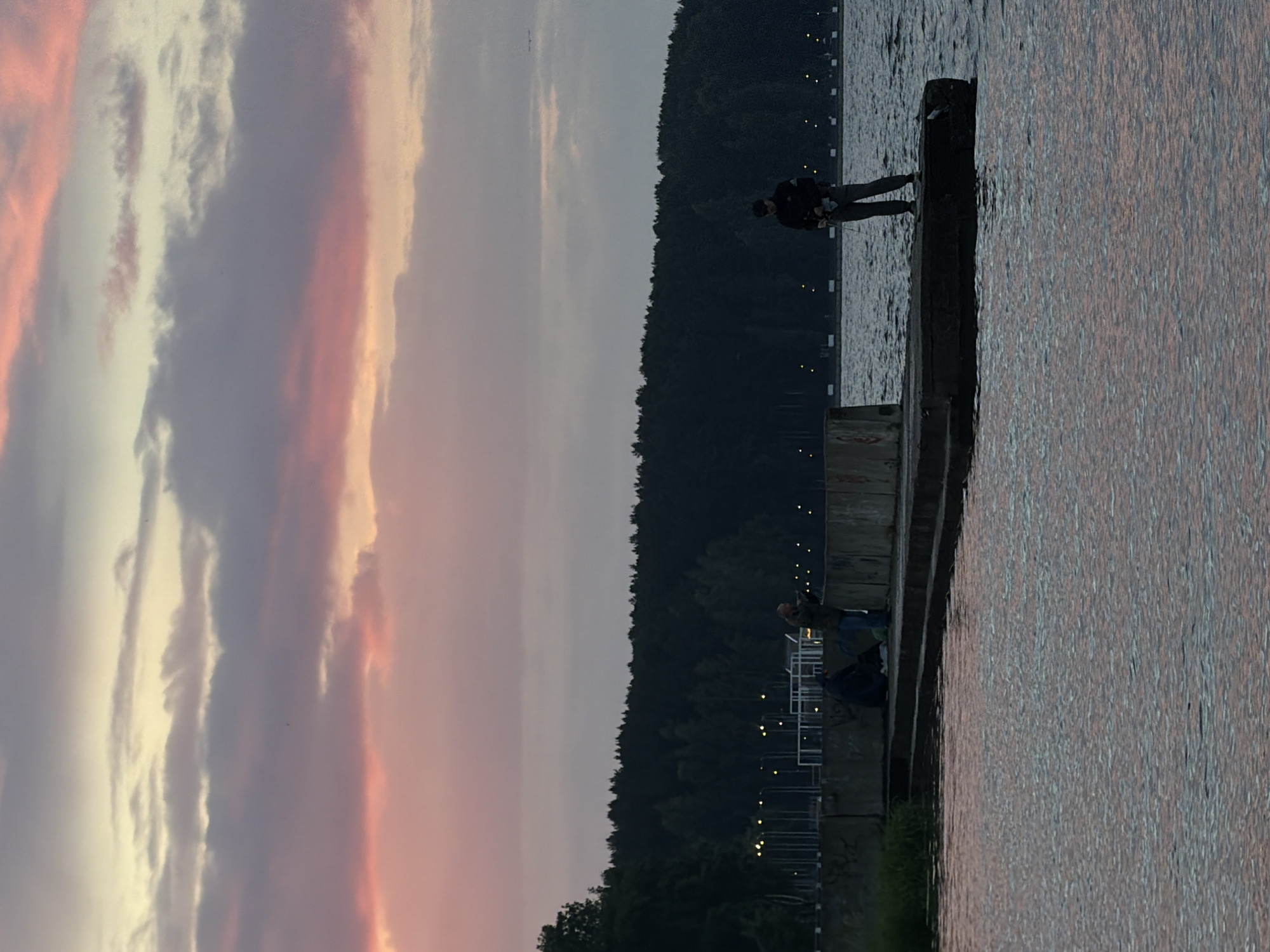 Evening gathering at Kama River during sunset in Chaikovsky