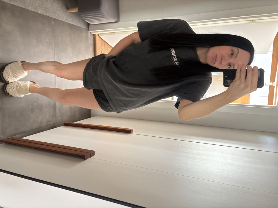 Woman documents morning fashion choices in Russian city selfies