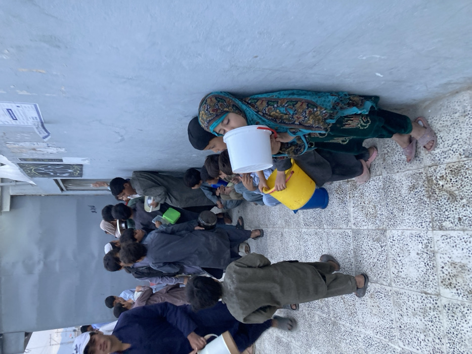 Daily life documented in Quetta includes food distribution