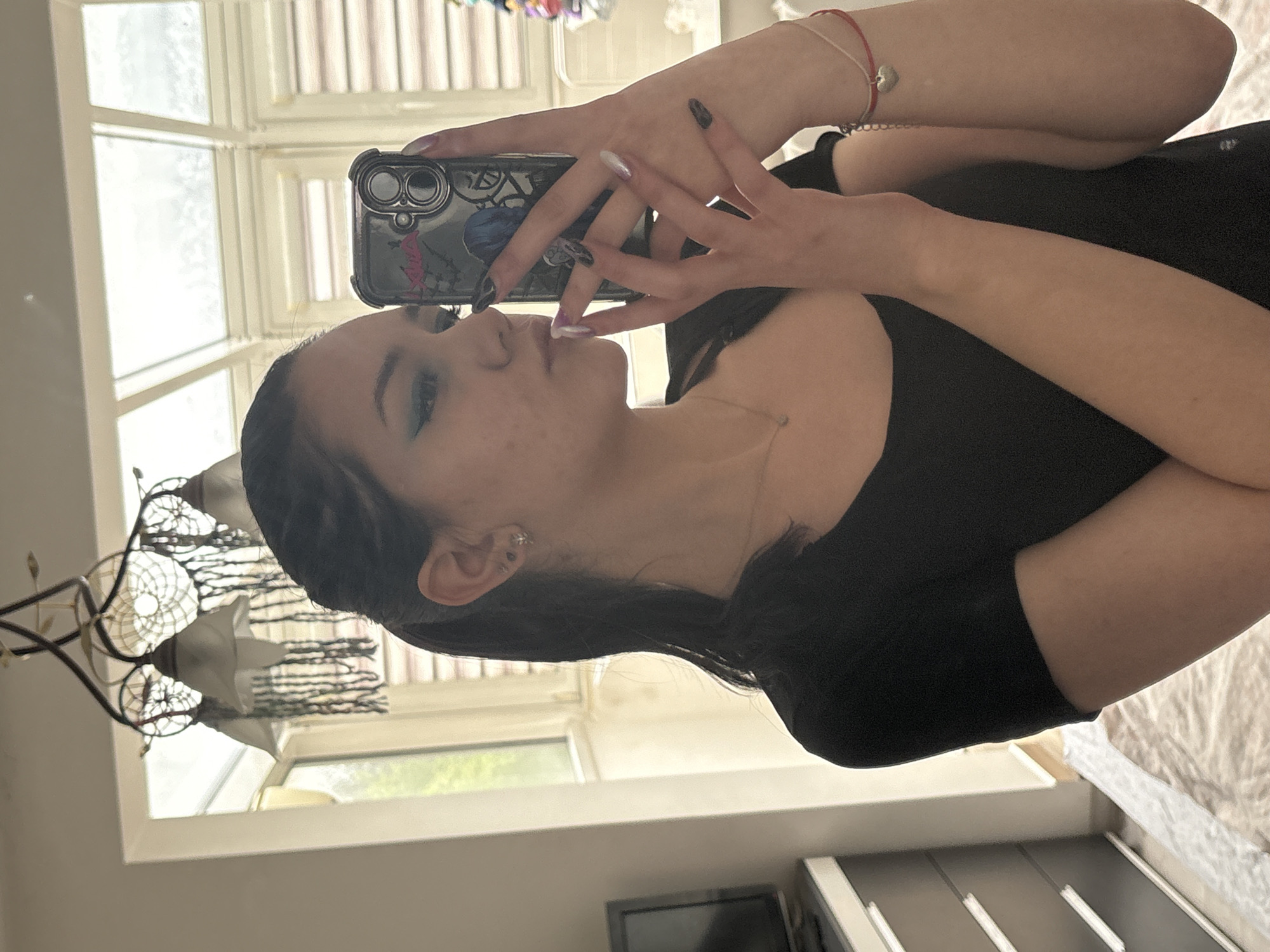 Woman takes indoor selfies in Sofia apartment