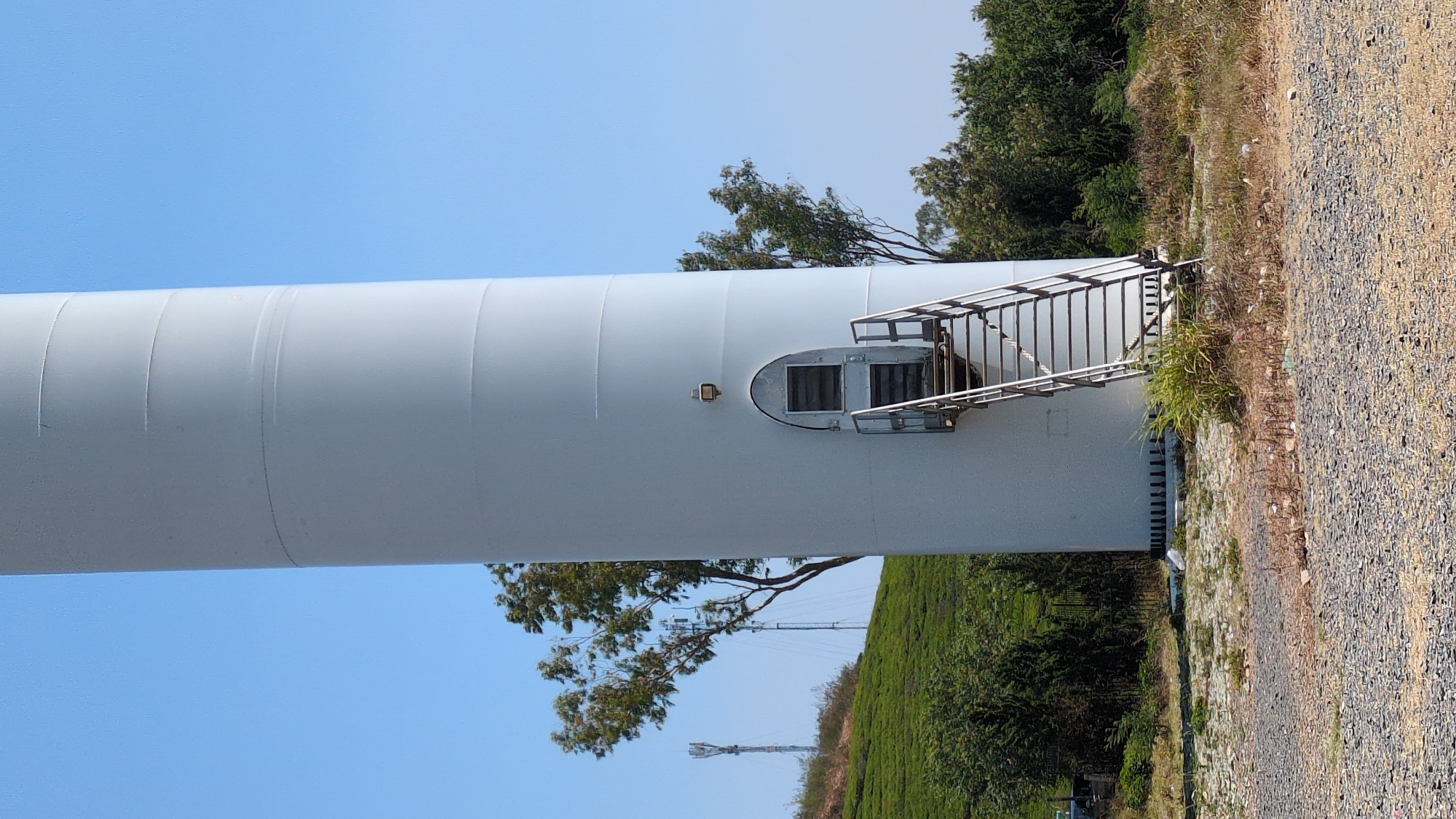 Wind turbine and excavator spotted in rural Vietnam