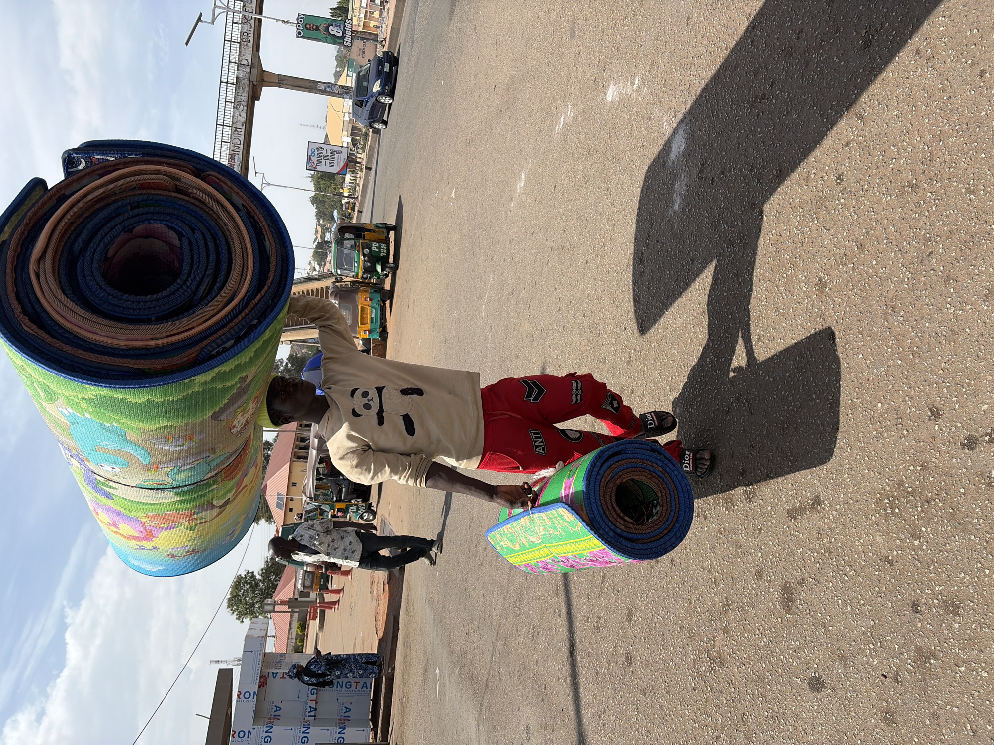 Daily life unfolds in Jos Nigeria streets and markets