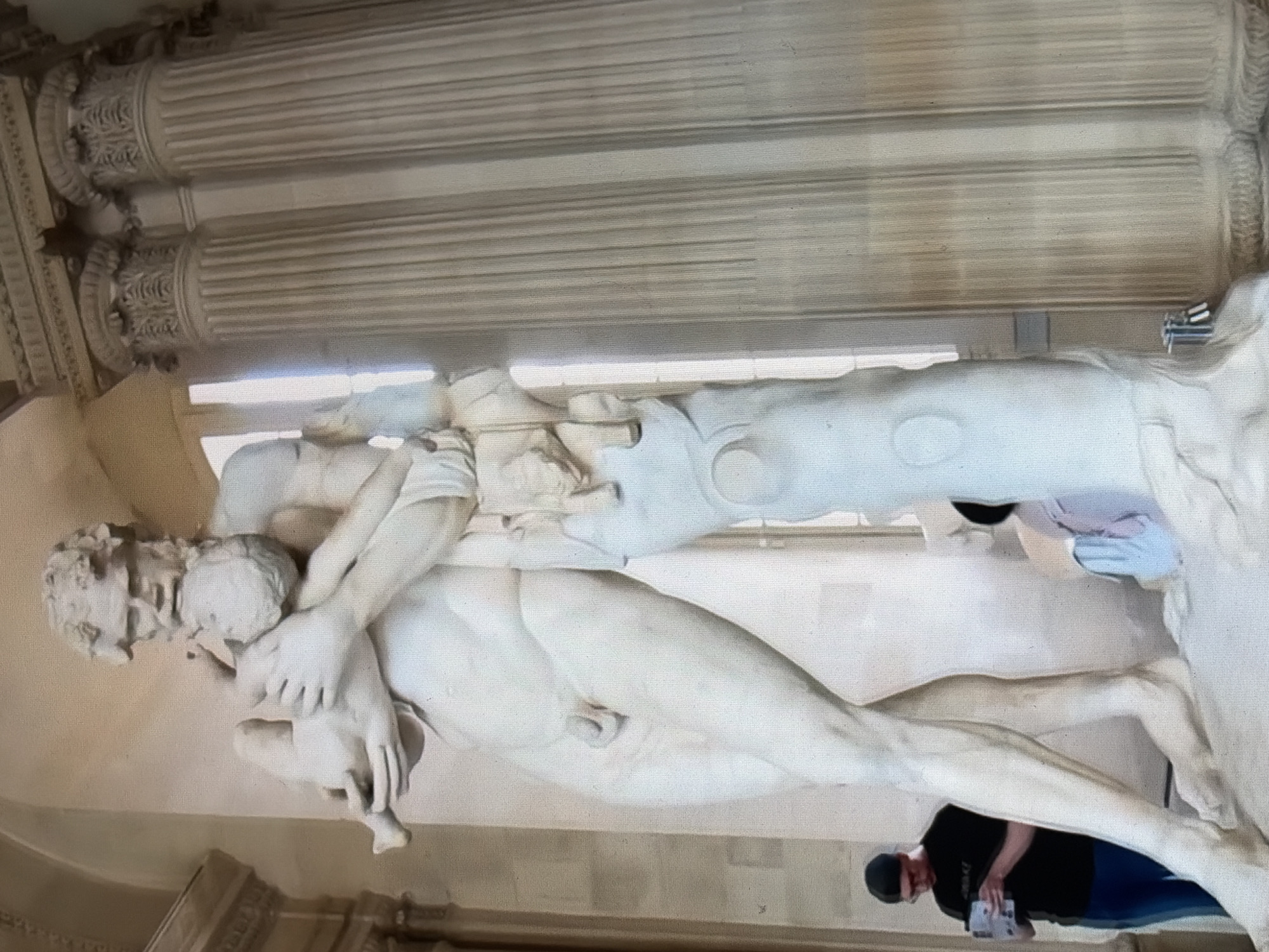 Exploring a classical sculpture museum's grand galleries and halls