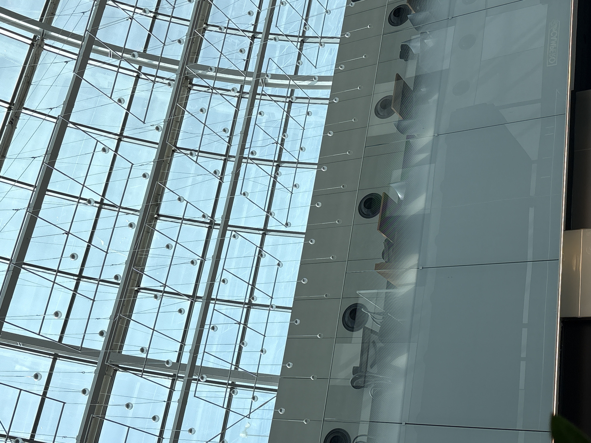 Morning exploring a modern indoor complex with retail and transit