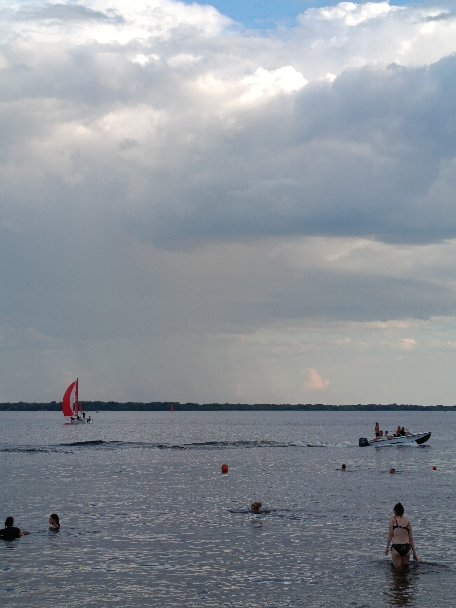 Summer day on the Volga: swimming, sailing, beach scenes