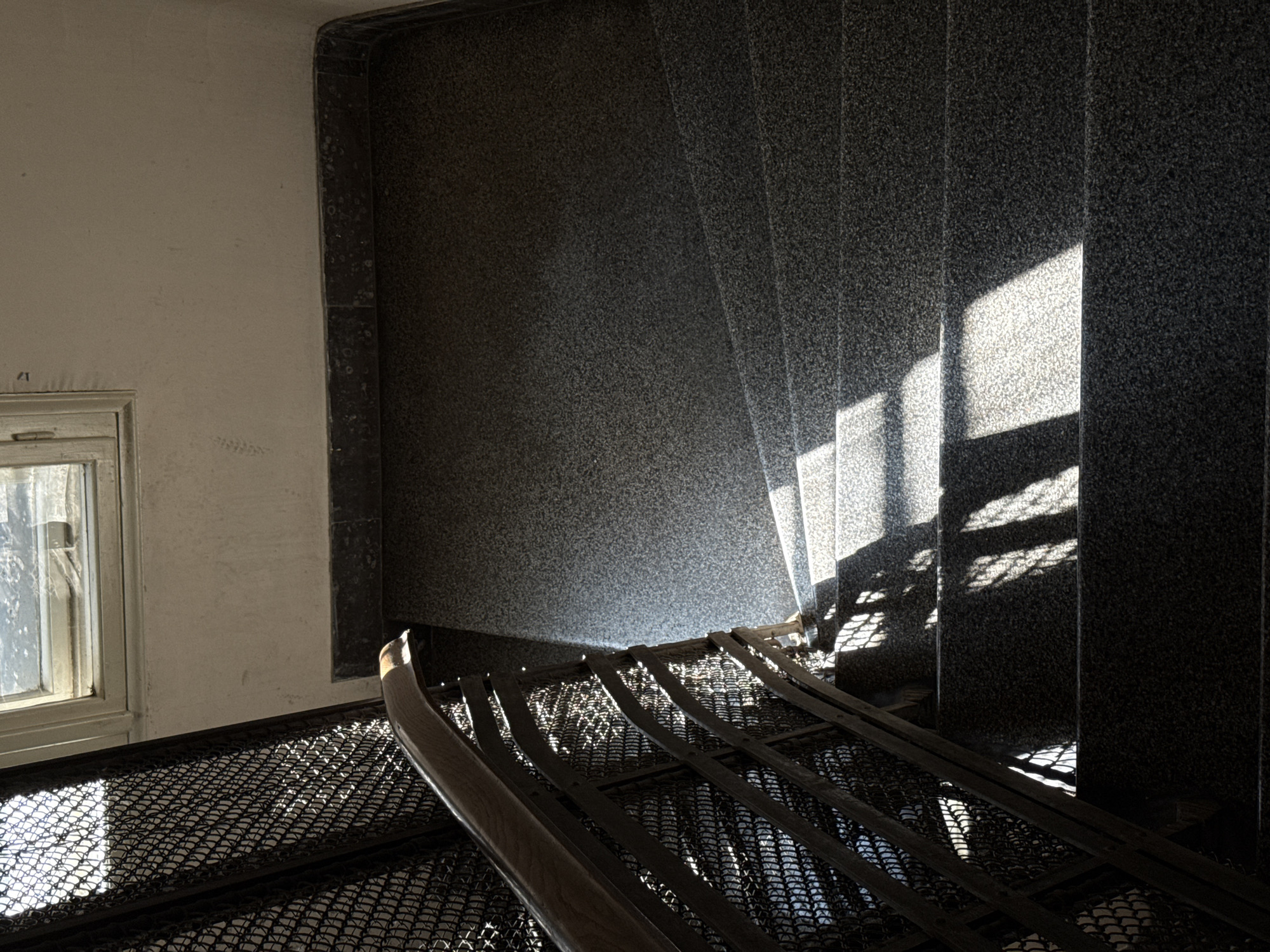 Morning sunlight illuminates old Belgrade building stairwell