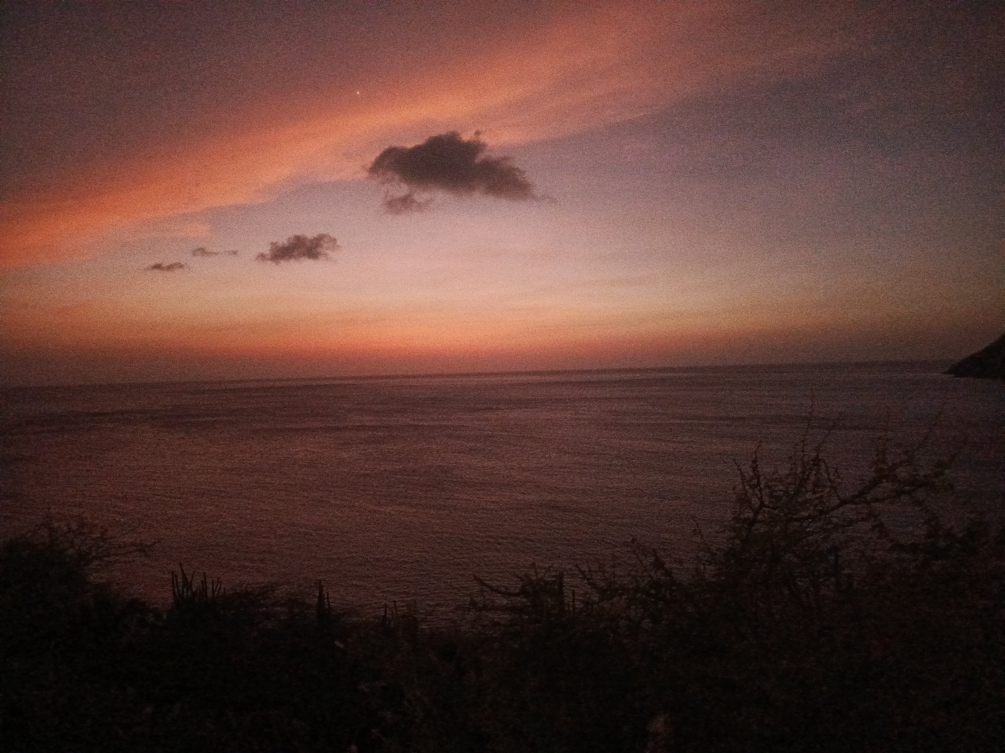 Sunset to nightfall documented over Juan Griego bay Venezuela