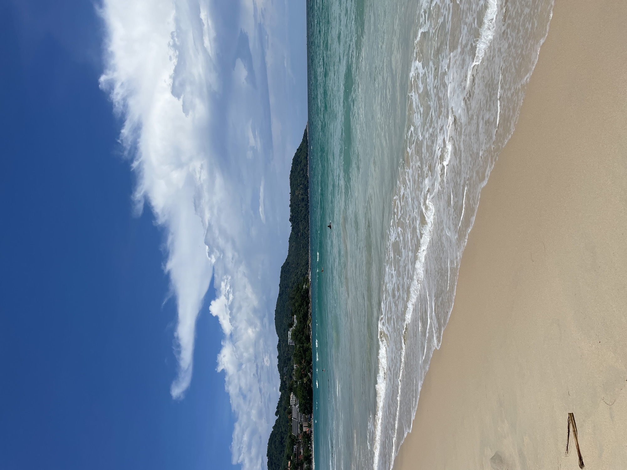 Morning beach activity with jet skiers at Karon, Thailand