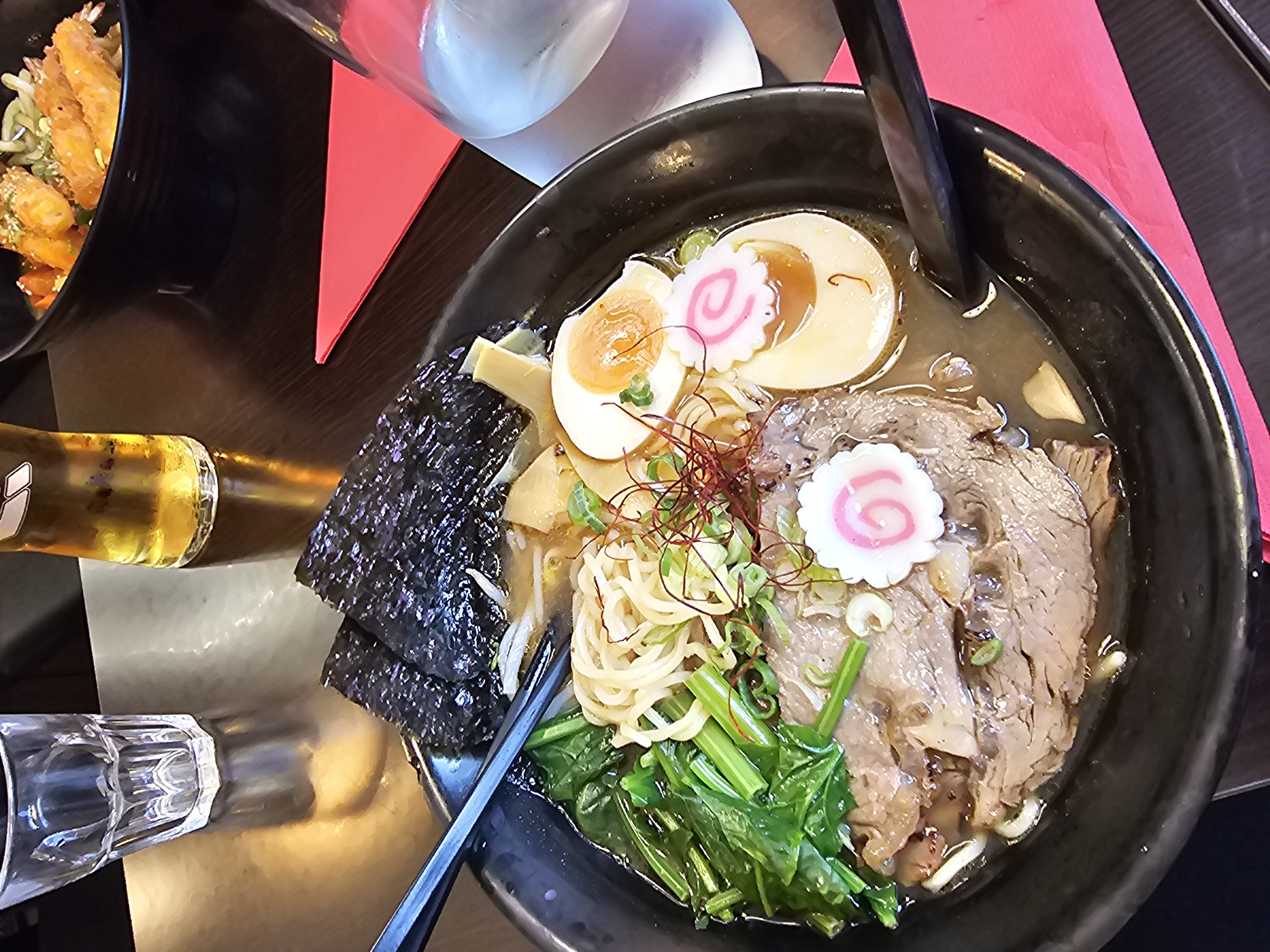 Diner documents Japanese restaurant meal in Paris evening