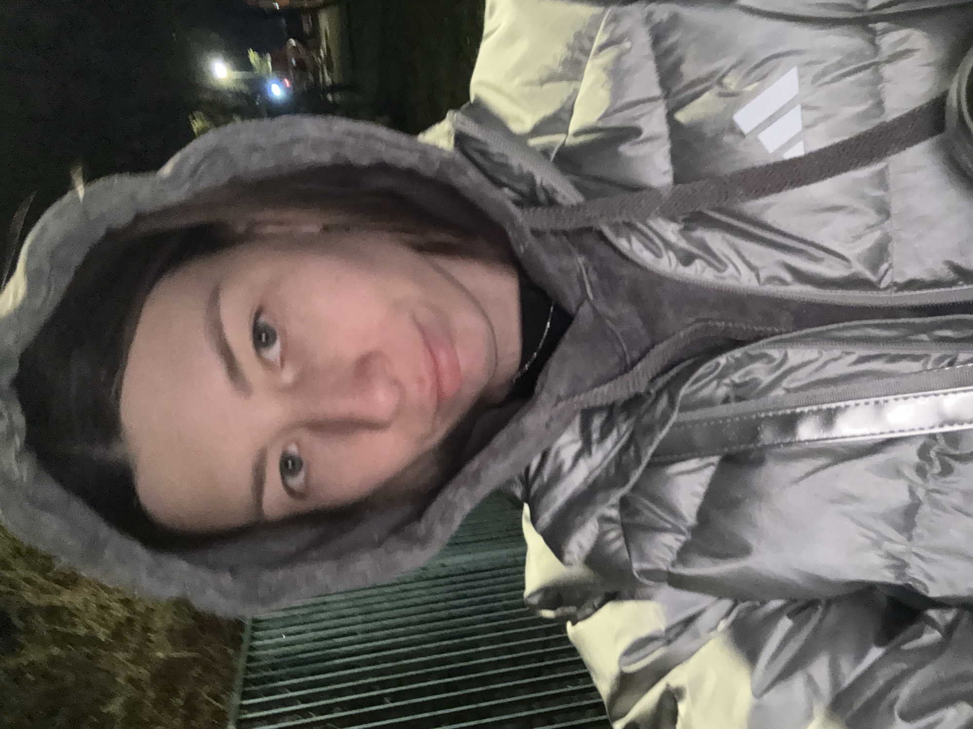 Nighttime walk documented in wet Moscow residential area