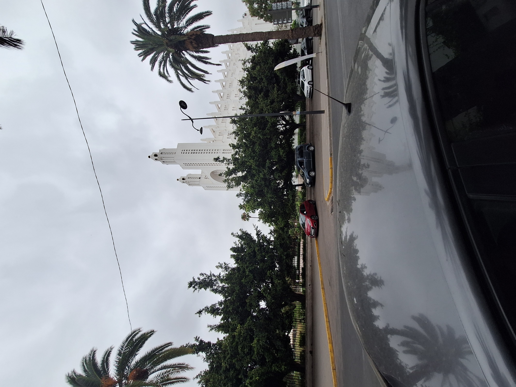 Inside and outside a modern Casablanca building, midday