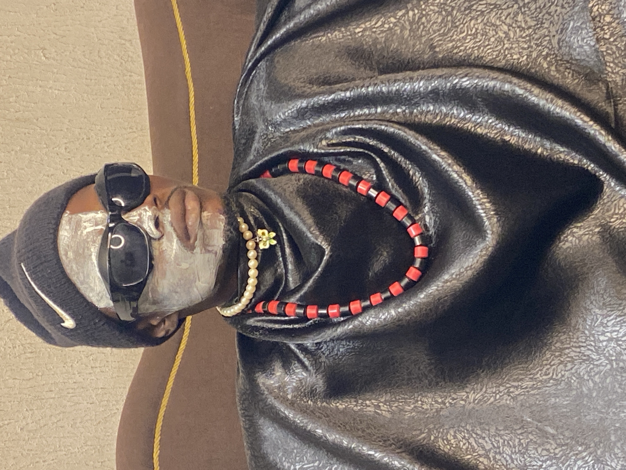 Styled portrait session in Abakaliki with face paint and beaded accessories