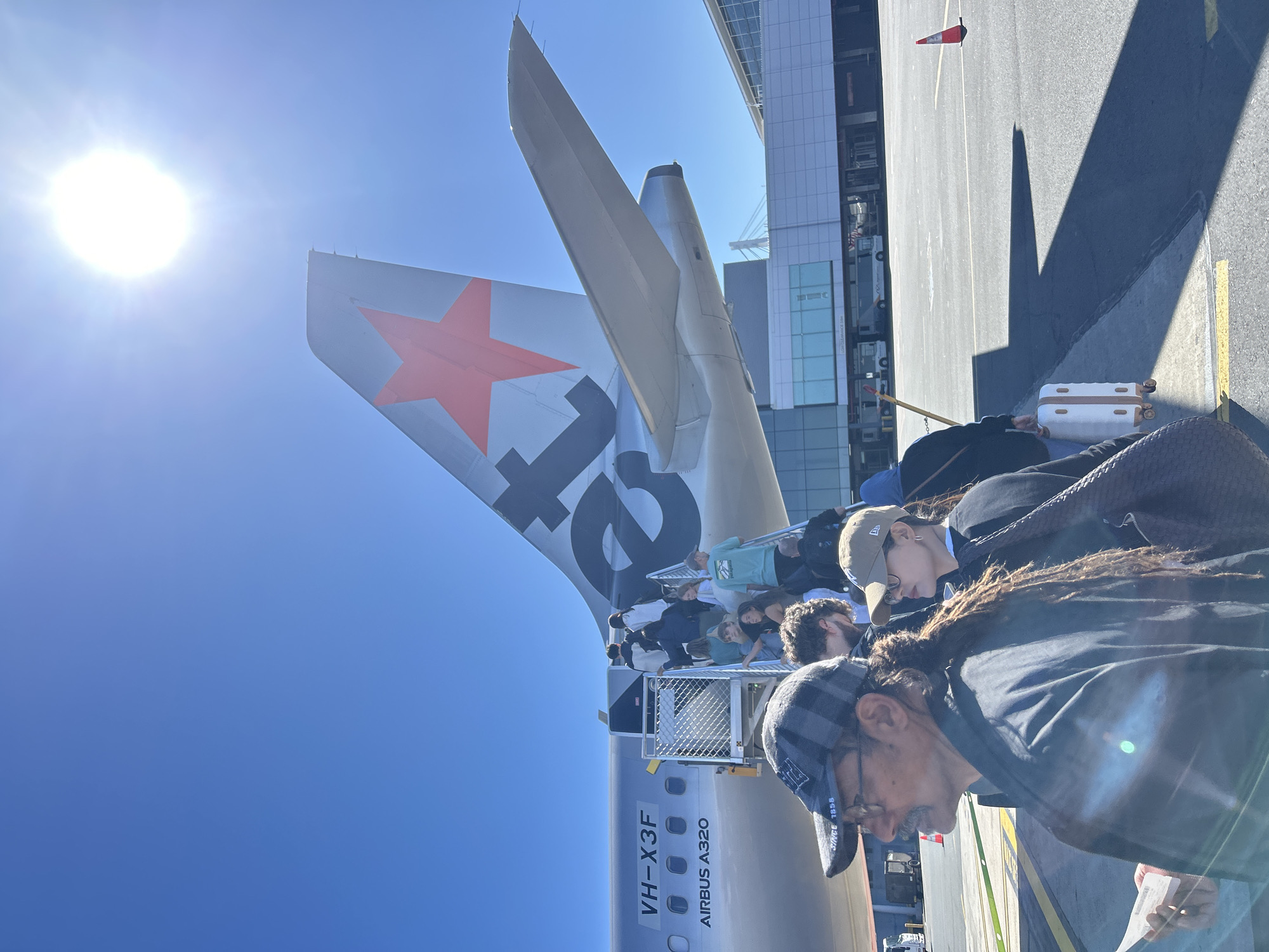 Jetstar passengers board A320 at Sydney Airport overnight