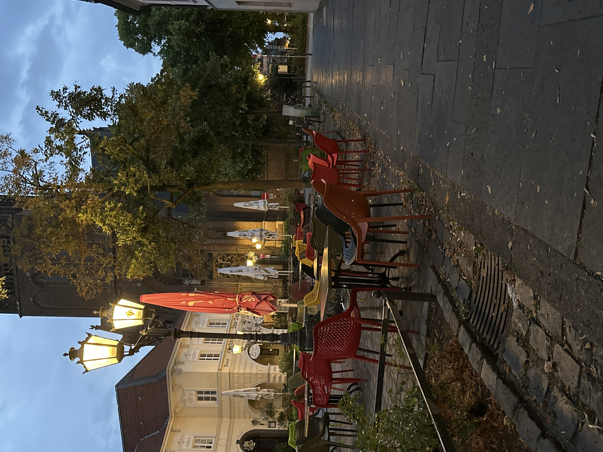 Krefeld's Neumarkt at dusk, St. Dionysius and quiet streets