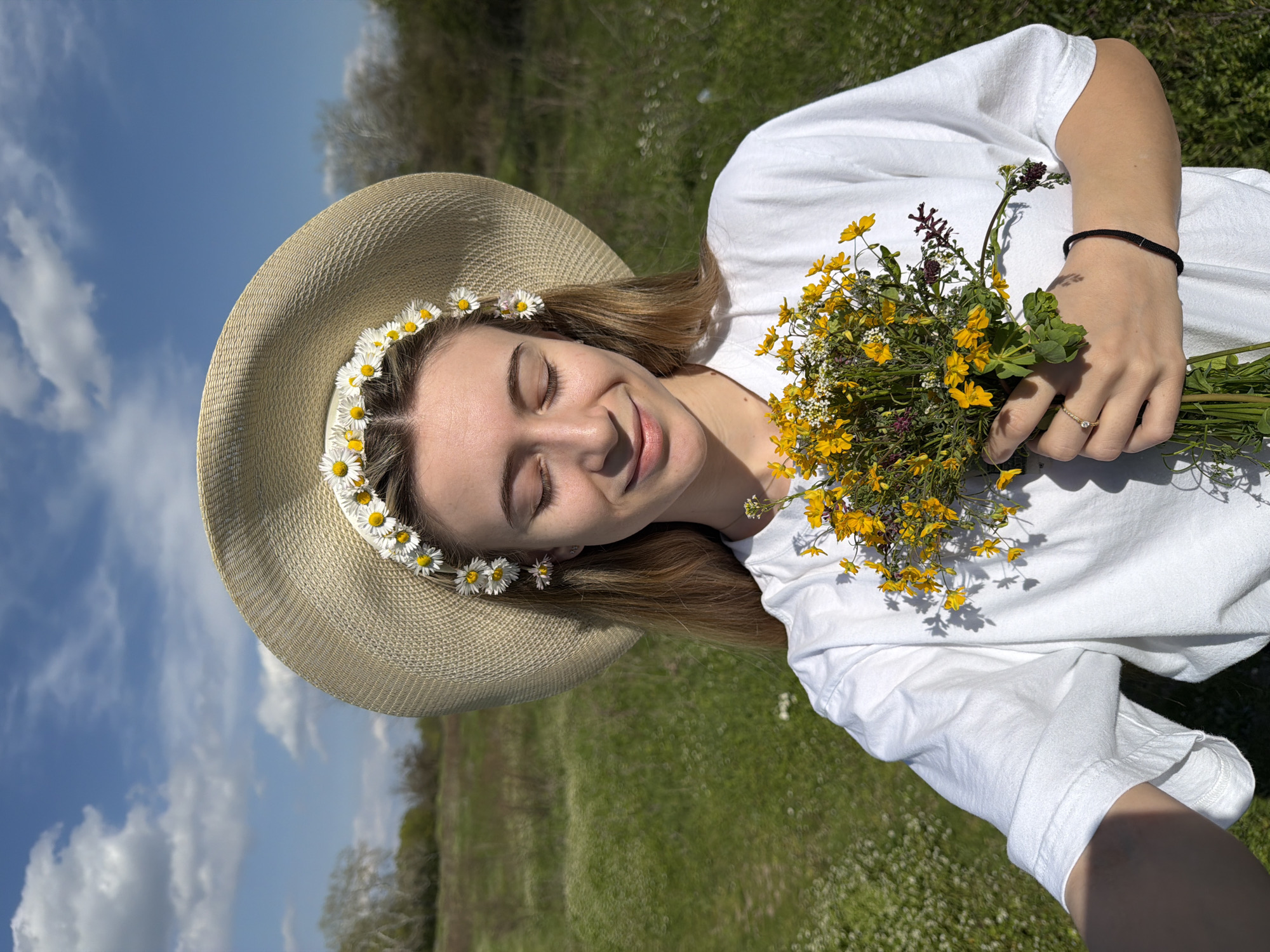 Couple enjoys spring flower field outing in Bulgarian countryside