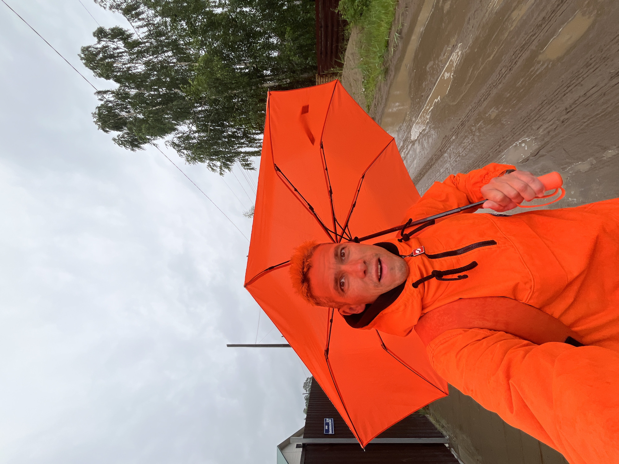 Rainy day selfies on a muddy road in Chaikovsky, Russia