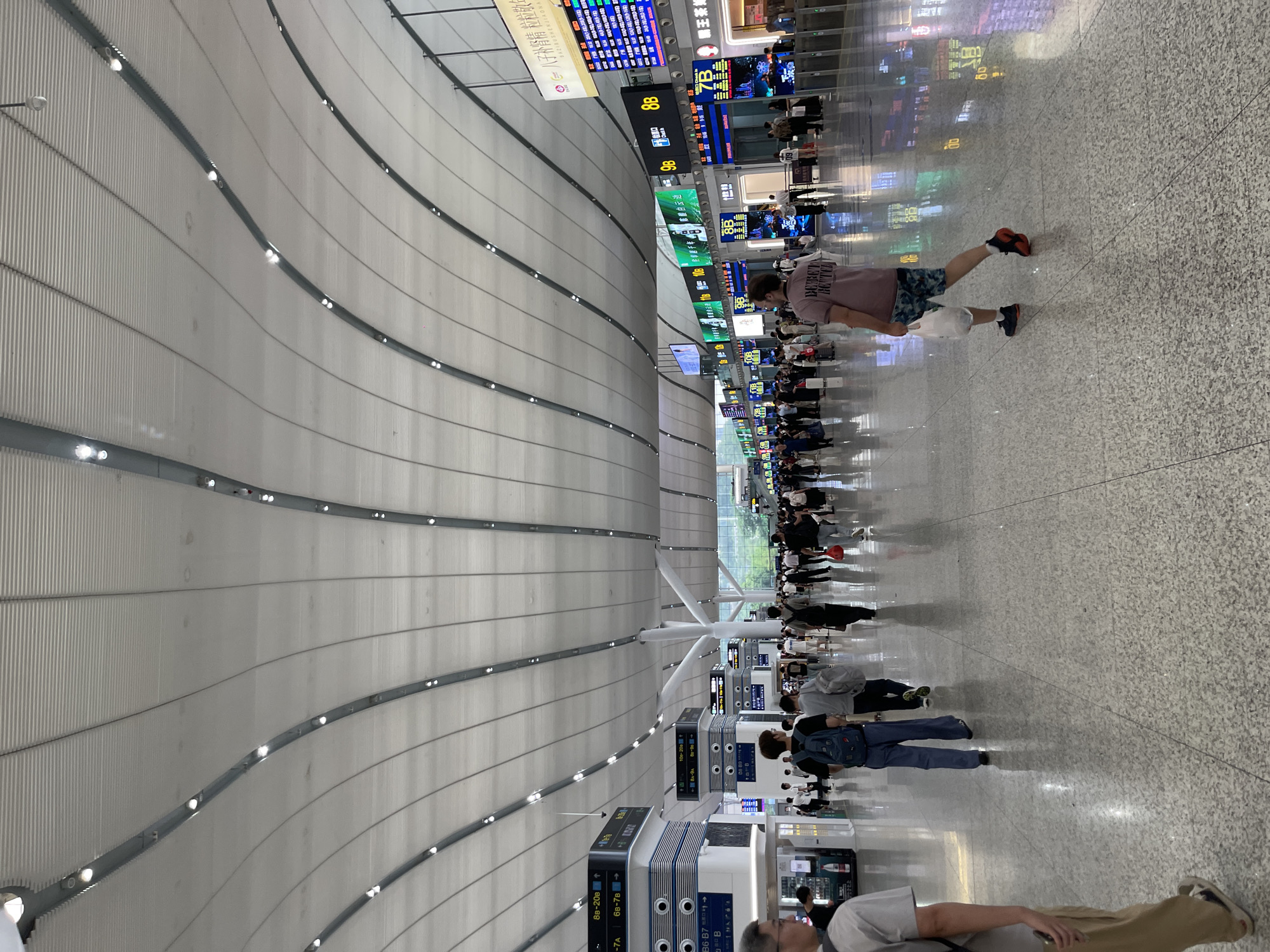 Morning rush inside a major Longhua transit hub