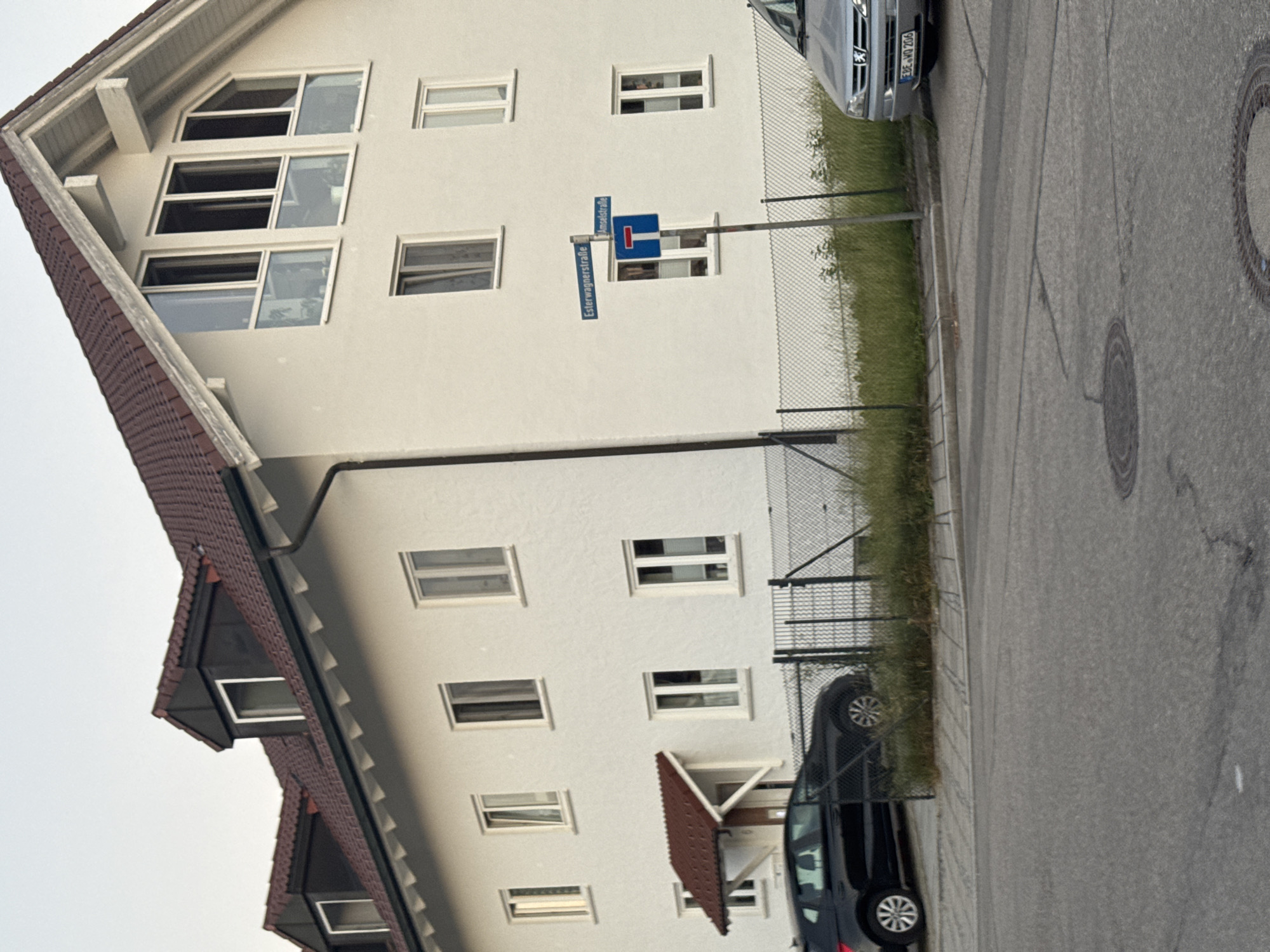 Quiet summer afternoon in a Munich suburb, streets and gardens