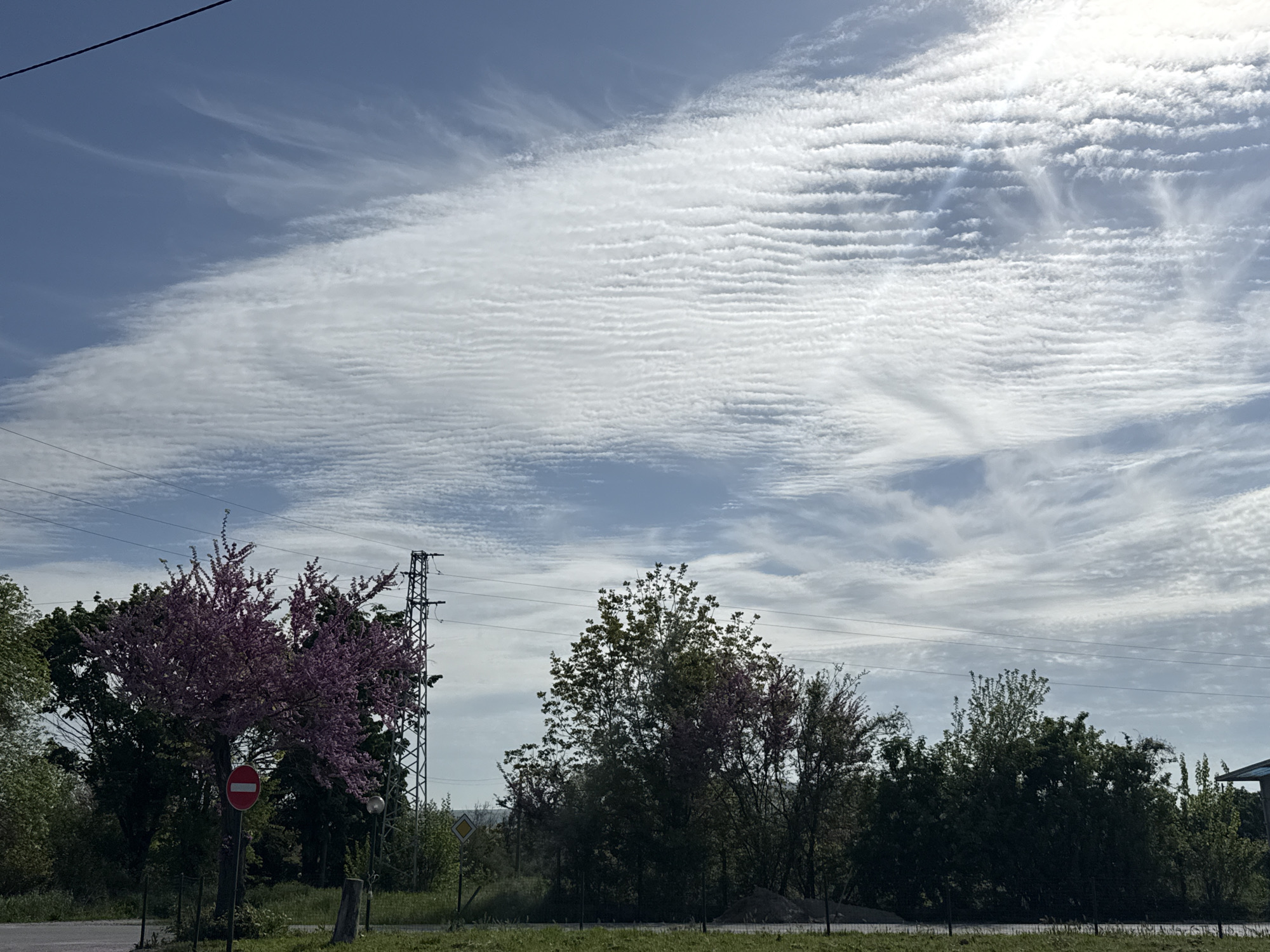Rippled altocumulus clouds observed over Belogradets, Bulgaria morning landscape