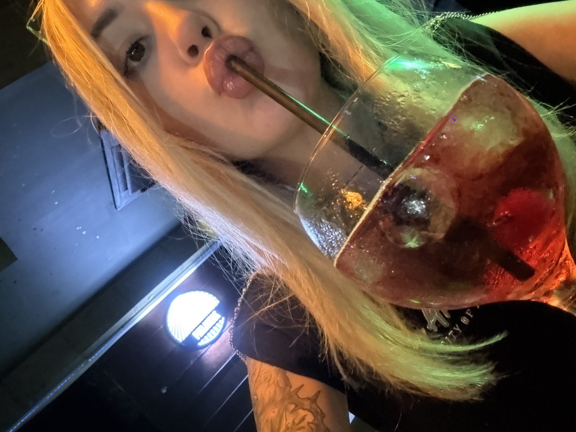 Two women enjoy evening drinks at Ruse nightclub