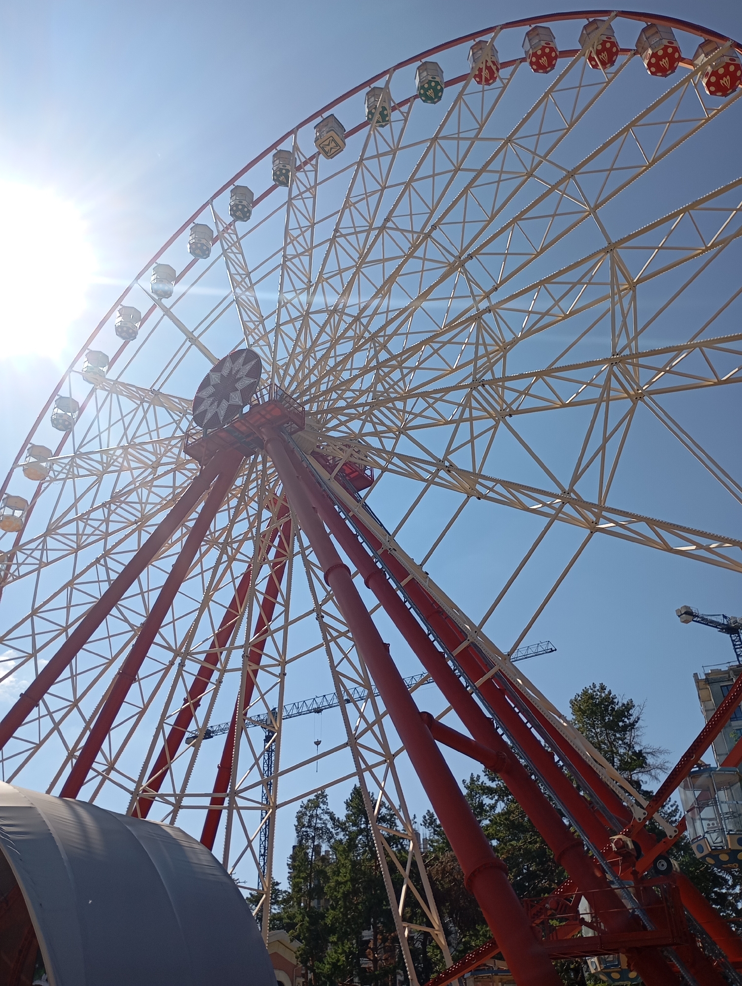 Colorful children's amusement park in Kharkiv on a sunny day