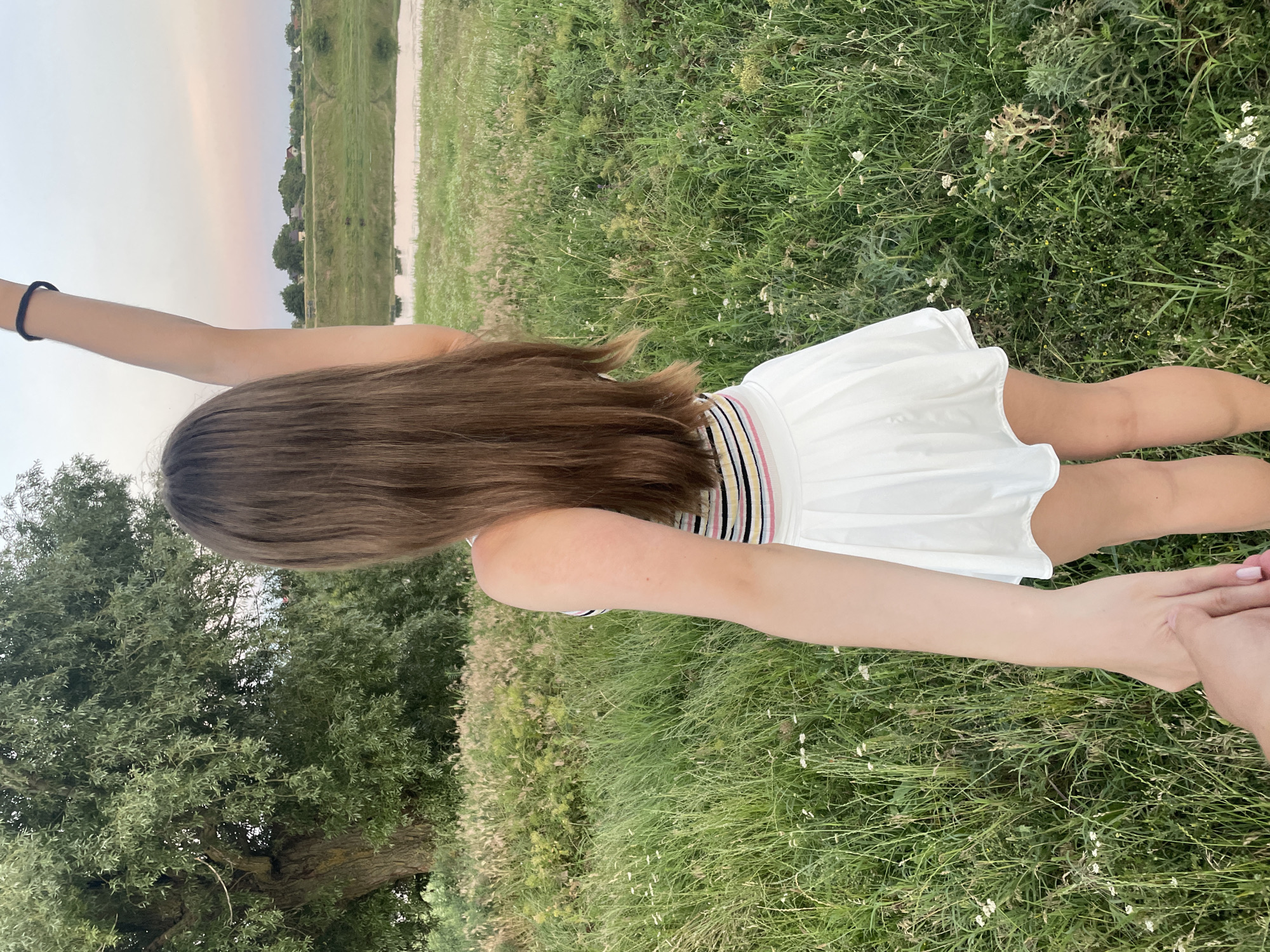 Dusk in a Moldovan field, wildflowers and still water