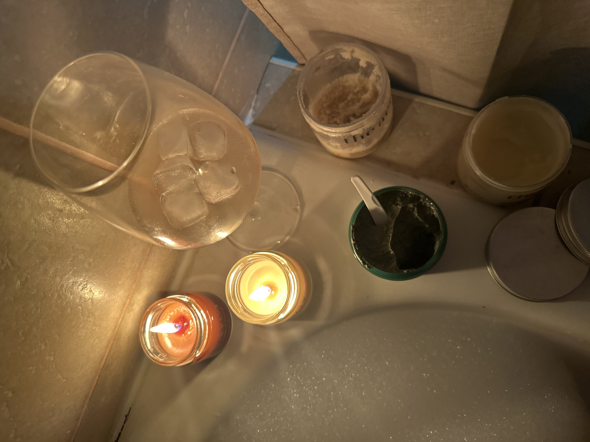 Candlelit bath night in Chaikovsky with wine and soccer